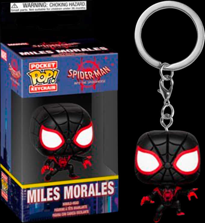 Clip Art 桌布 壁紙 — 一個黑色和紅色的 Miles Morales Spider-Man Pocket Pop! 鑰匙圈，帶有發光的白色眼睛，展示在其色彩繽紛的包裝旁邊。
