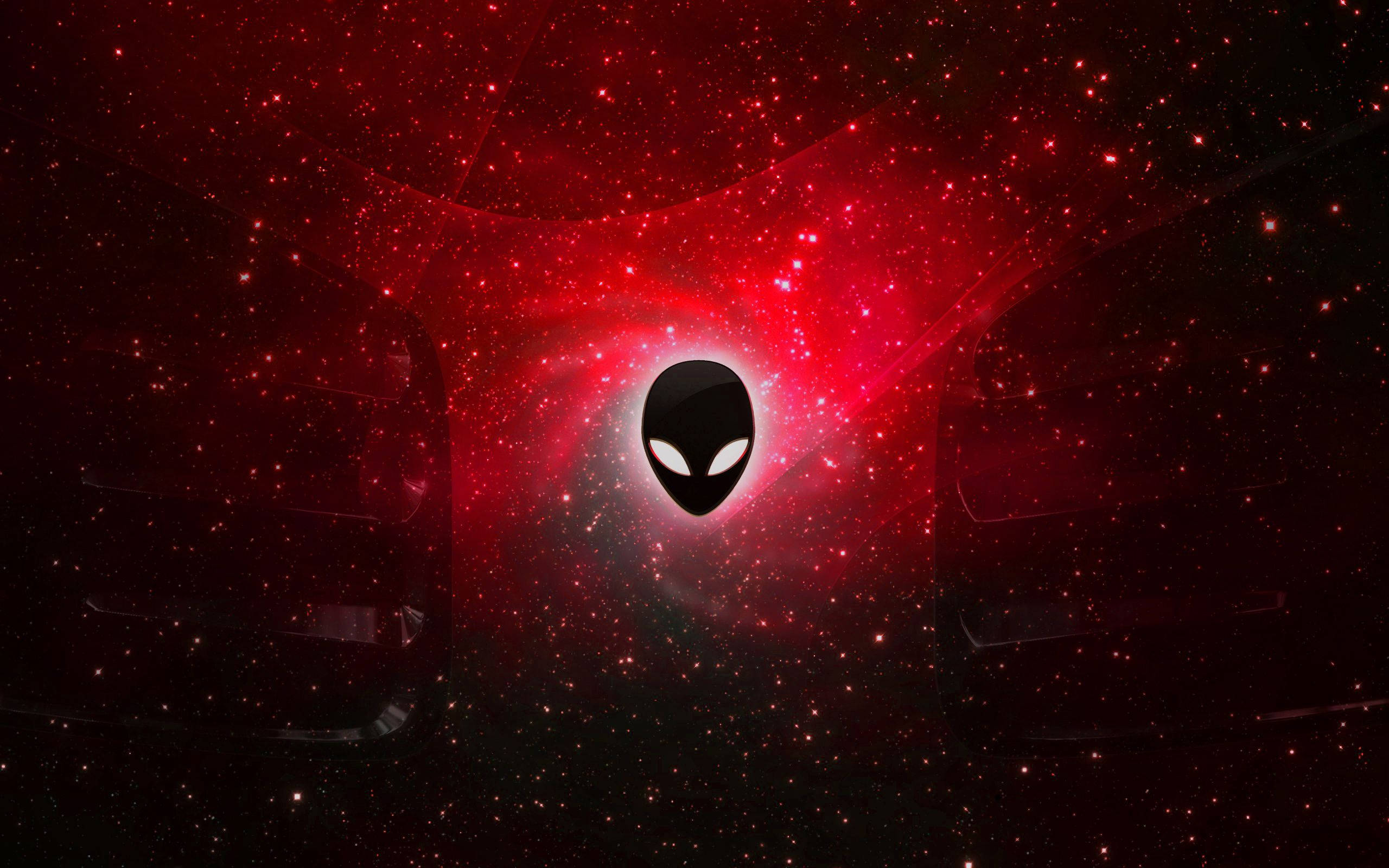 外星人 桌布 壁紙 — 一個黑色外星人頭標誌在深空中充滿星星的旋轉紅色星雲中發光。