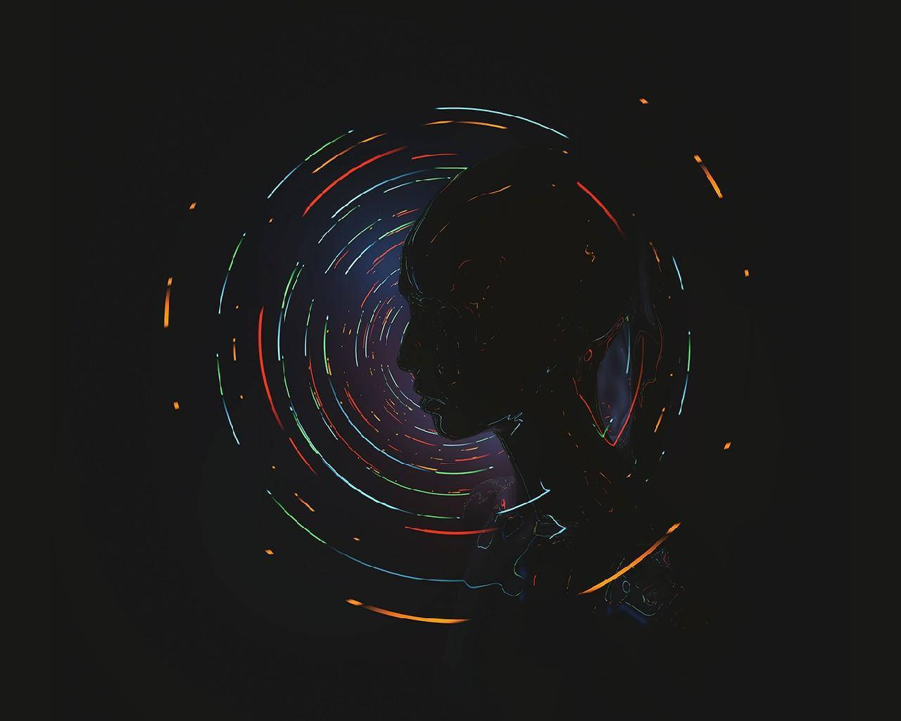 AMOLED 桌布 壁紙 — 一個黑色背景上，被旋轉霓虹光軌包圍的人類頭部側面黑色剪影。