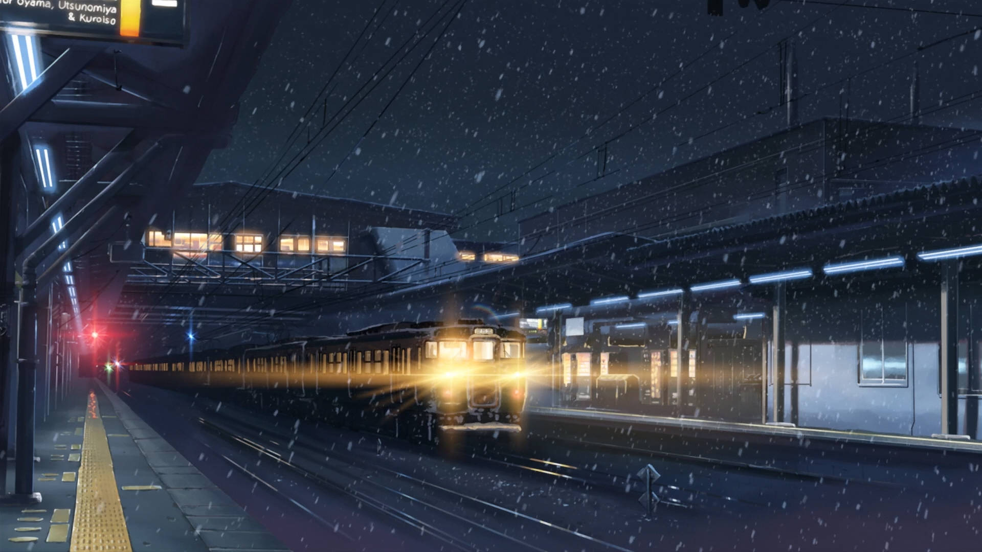 Anime Night City 桌布 壁紙 — 一列帶有發光頭燈的火車在雪夜車站疾馳，雪花在霓虹燈下飄舞。