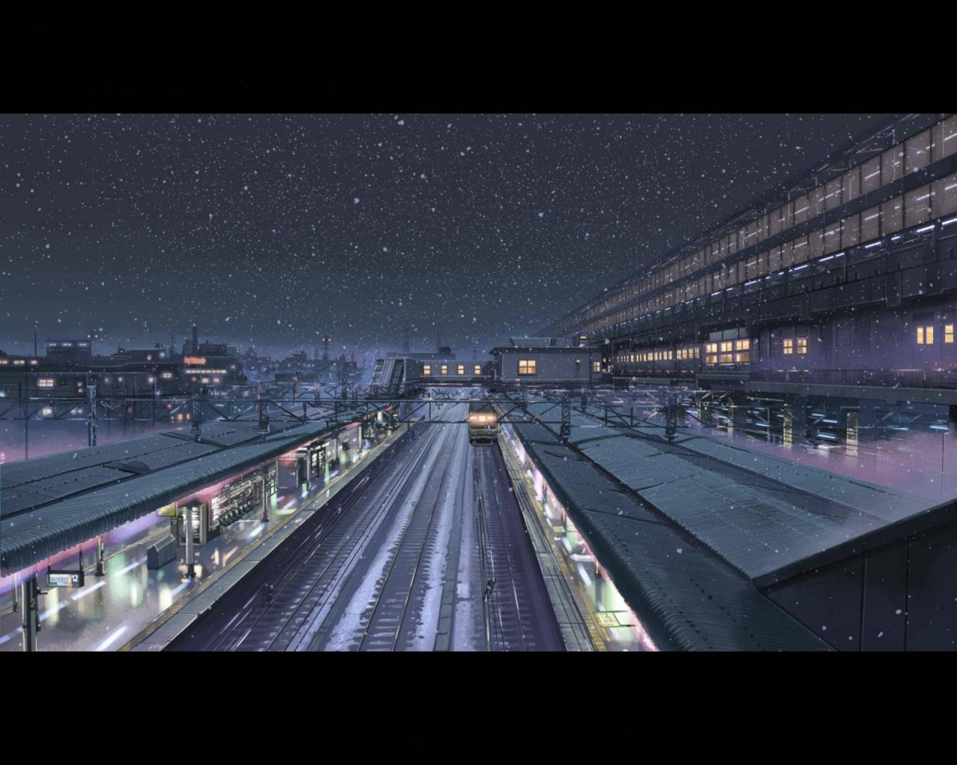 Second 桌布 壁紙 — 一列火車在星空下，飄雪和發光的燈光中，滑過一個雪夜的車站。