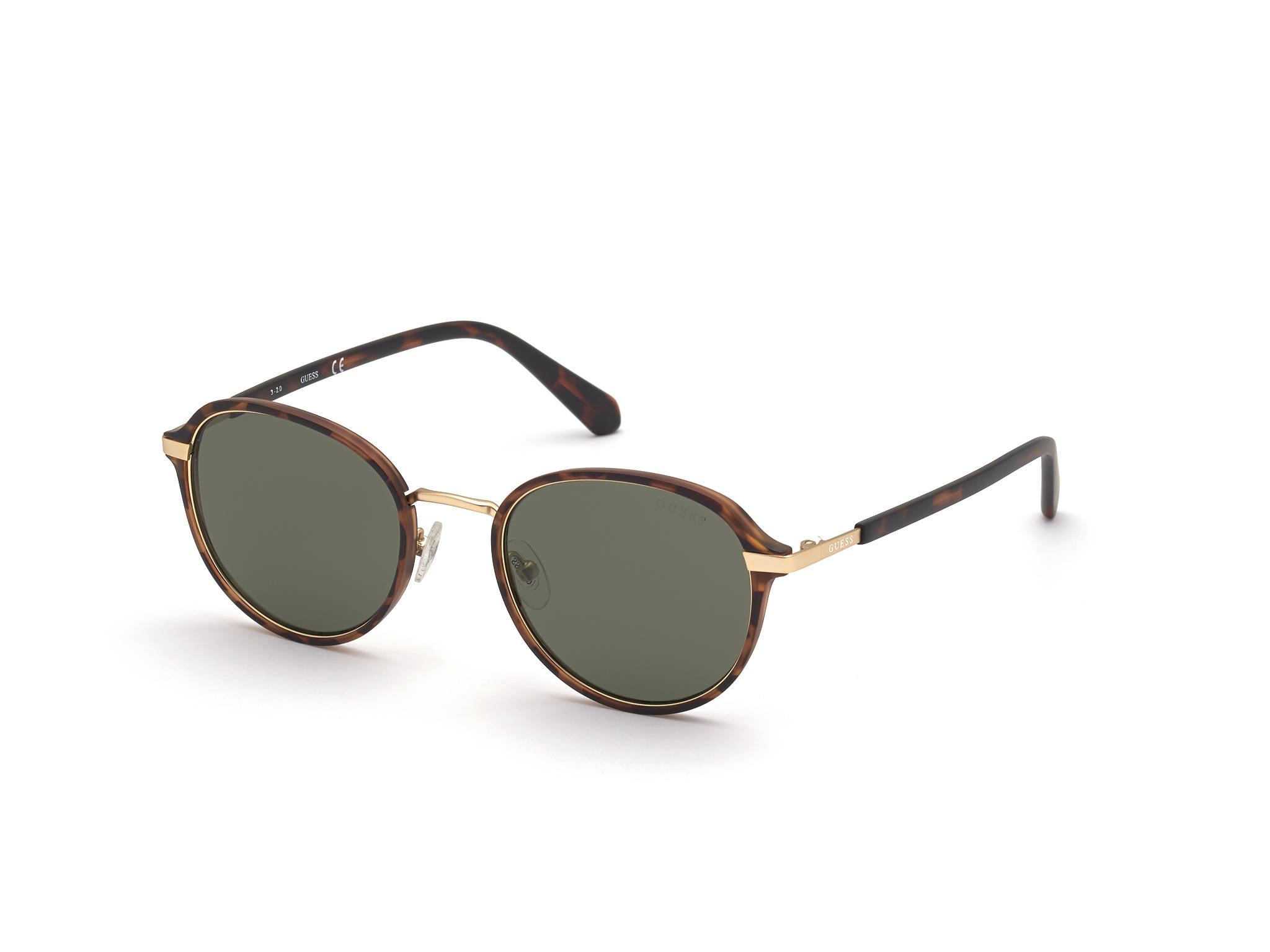 Sunglasses 桌布 壁紙 — 一副優雅的玳瑁太陽眼鏡，帶有金色點綴和深綠色鏡片，放在潔白的表面上。