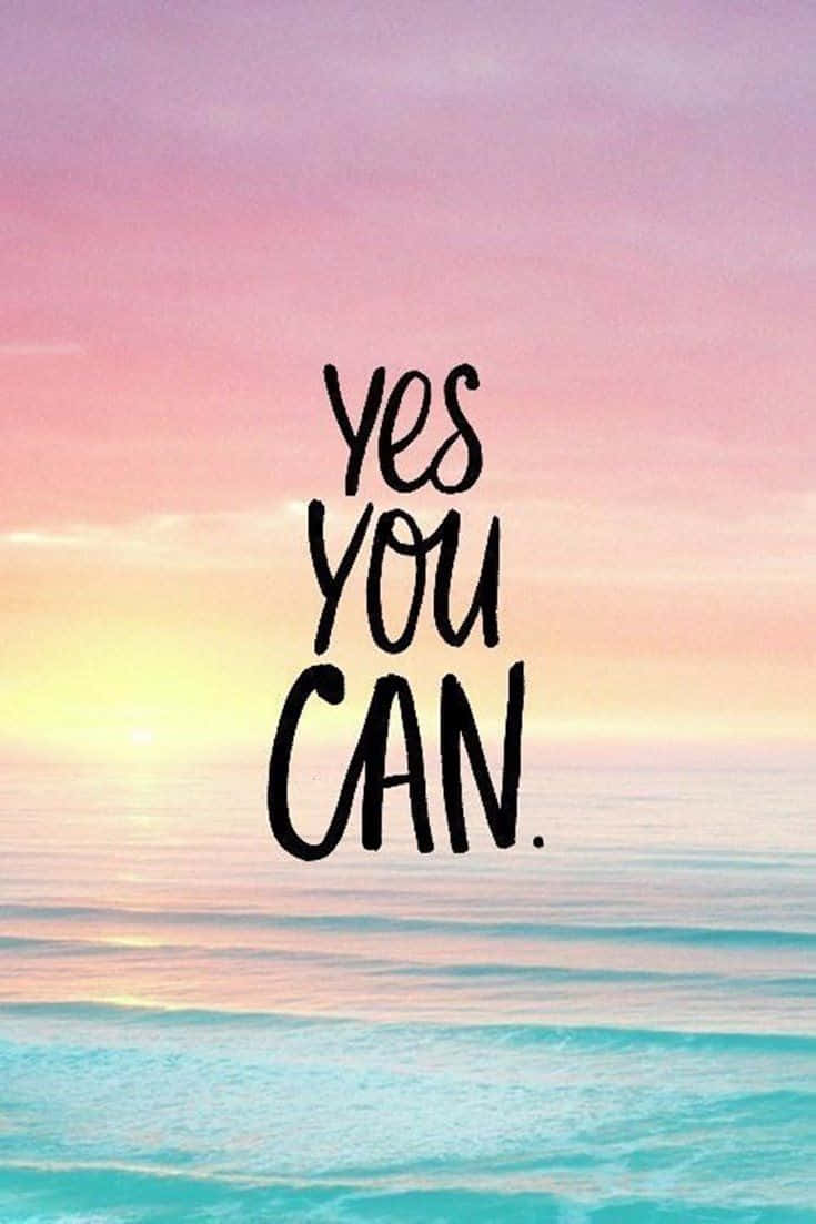 桌布 壁紙 — 一句勵志名言 yes you can 漂浮在寧靜的海洋上，夕陽呈現粉紅和藍綠色調。