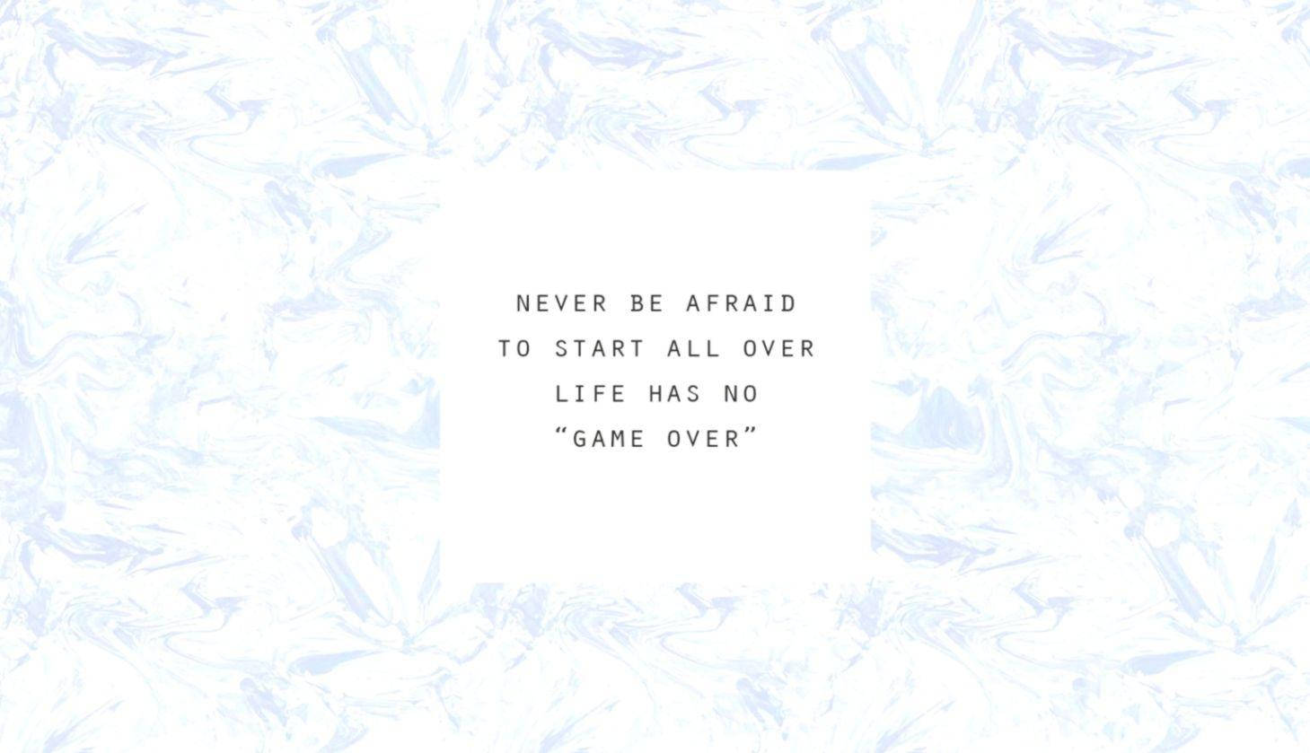 Motivational Quotes 桌布 壁紙 — 一句勵志語錄以粗體黑色文字顯示在白色矩形上，置中於柔和的藍白大理石紋背景。