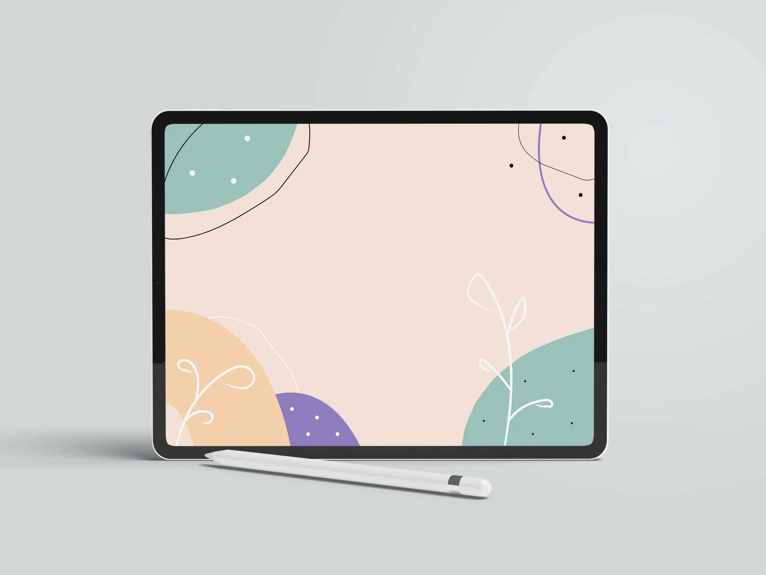 美學 iPad 壁紙 桌布 壁紙 — 一台時尚平板電腦在極簡灰色背景上顯示帶有柔和形狀和精緻線條藝術的粉彩抽象桌布。