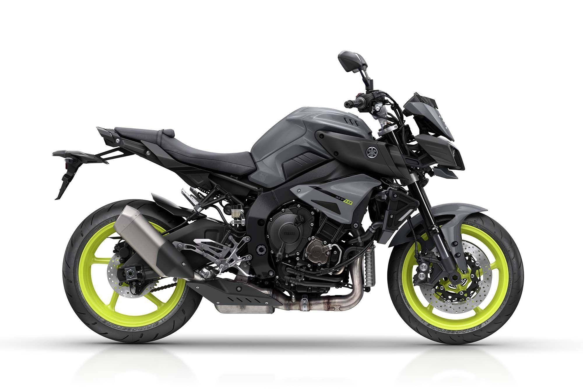 yamaha mt 15 桌布 壁紙 — 一台時尚的霧面黑色摩托車，搭配螢光黃色輪圈，在純白色背景下的攝影棚燈光中展示。