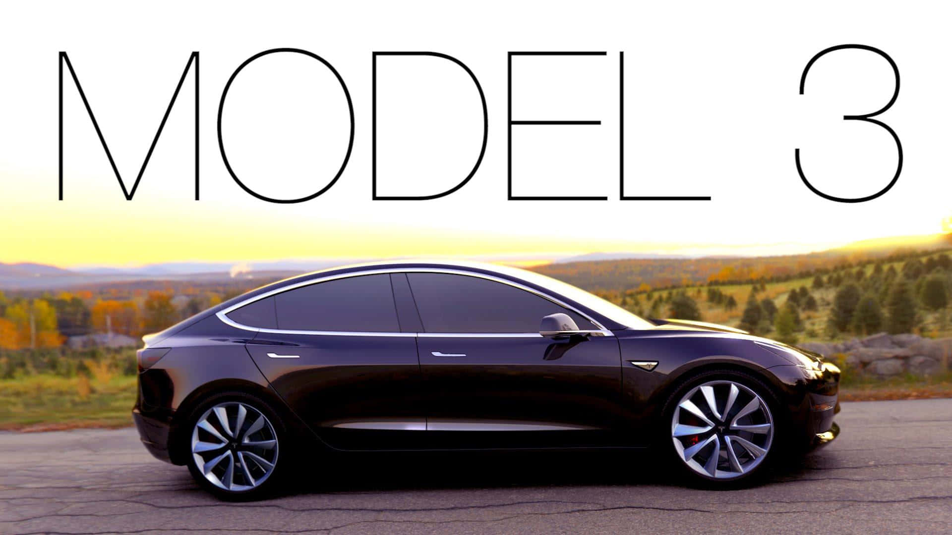 Tesla Model 3 桌布 壁紙 — 一台時尚的黑色Tesla Model 3停泊在日落時分的鋪砌道路上，背景是起伏的丘陵和秋天的樹木。