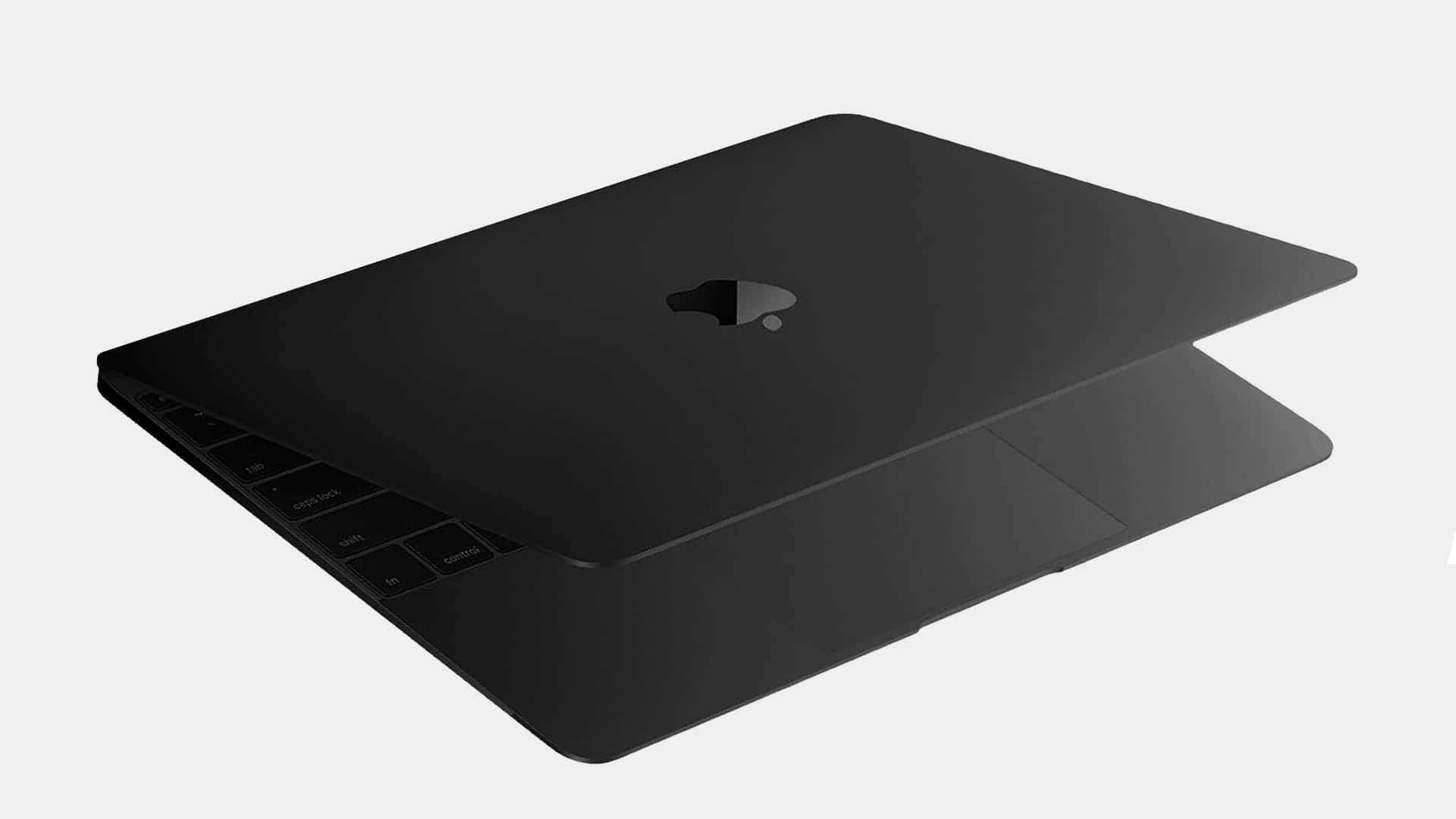 Black Macbook 桌布 壁紙 — 一台時尚的黑色筆記型電腦，採用極簡設計，在純色背景上可見鍵盤按鍵。