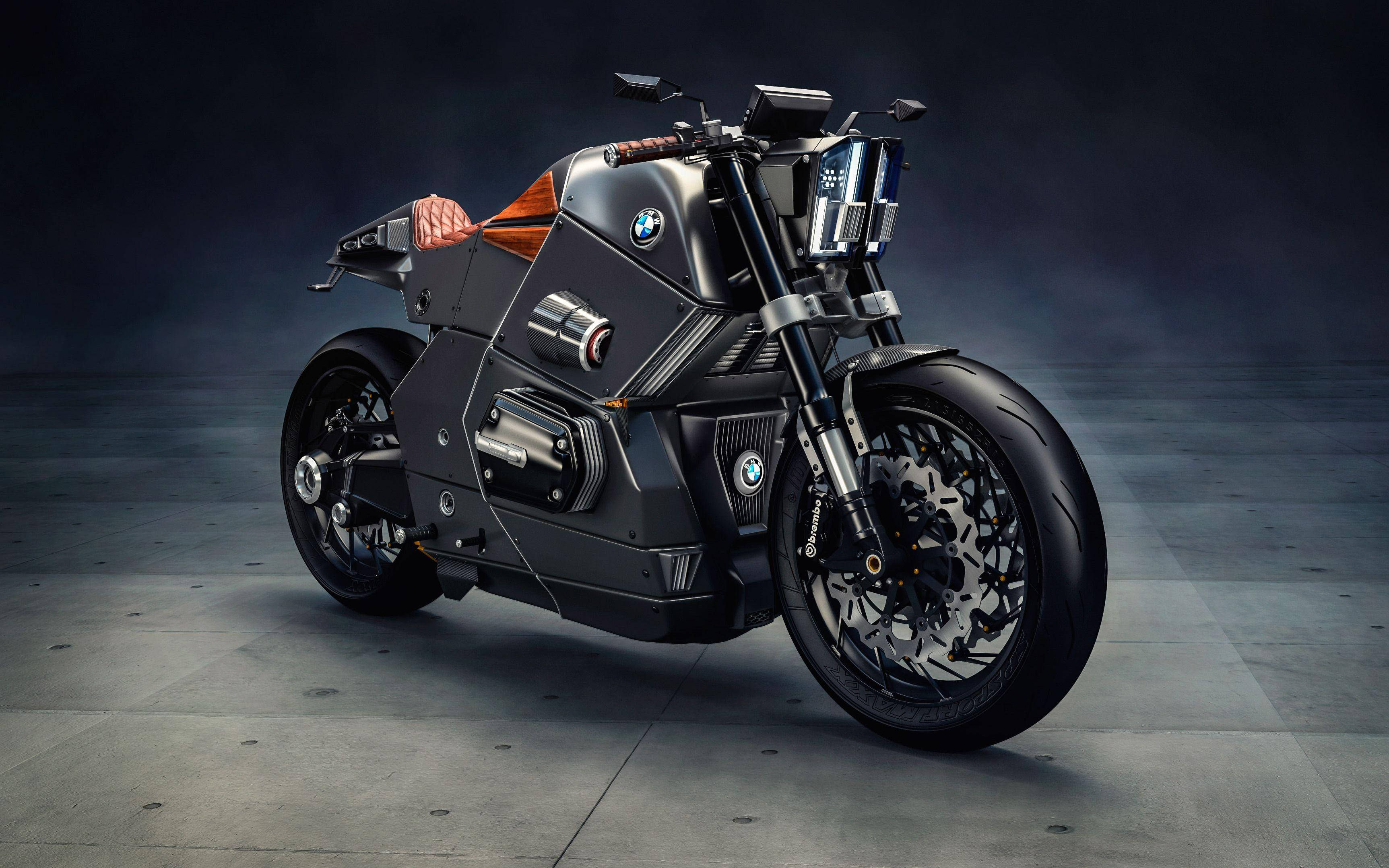 4K bike 桌布 壁紙 — 一台時尚黑色BMW機車帶有橙色點綴，在戲劇性的工作室燈光下立於混凝土地板上。