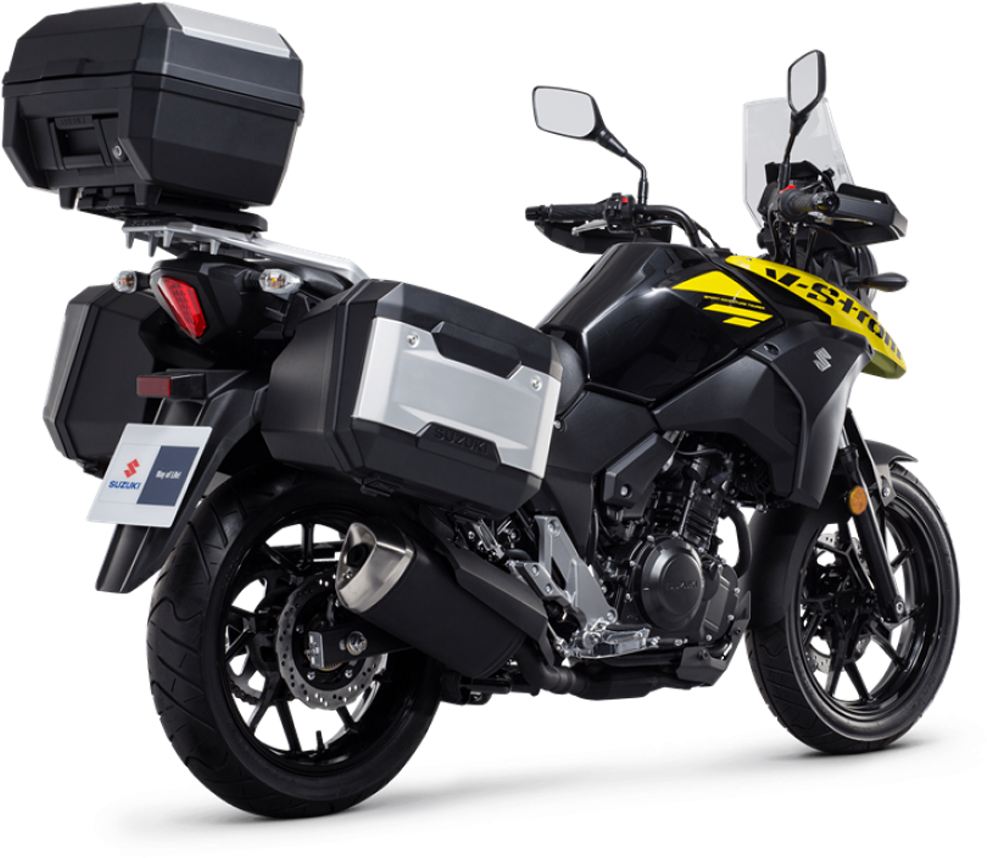 機車 桌布 壁紙 — 一台黑色和黃色的鈴木 V-Strom 探險摩托車，配備銀色側箱和頂箱，準備好進行長途旅行。