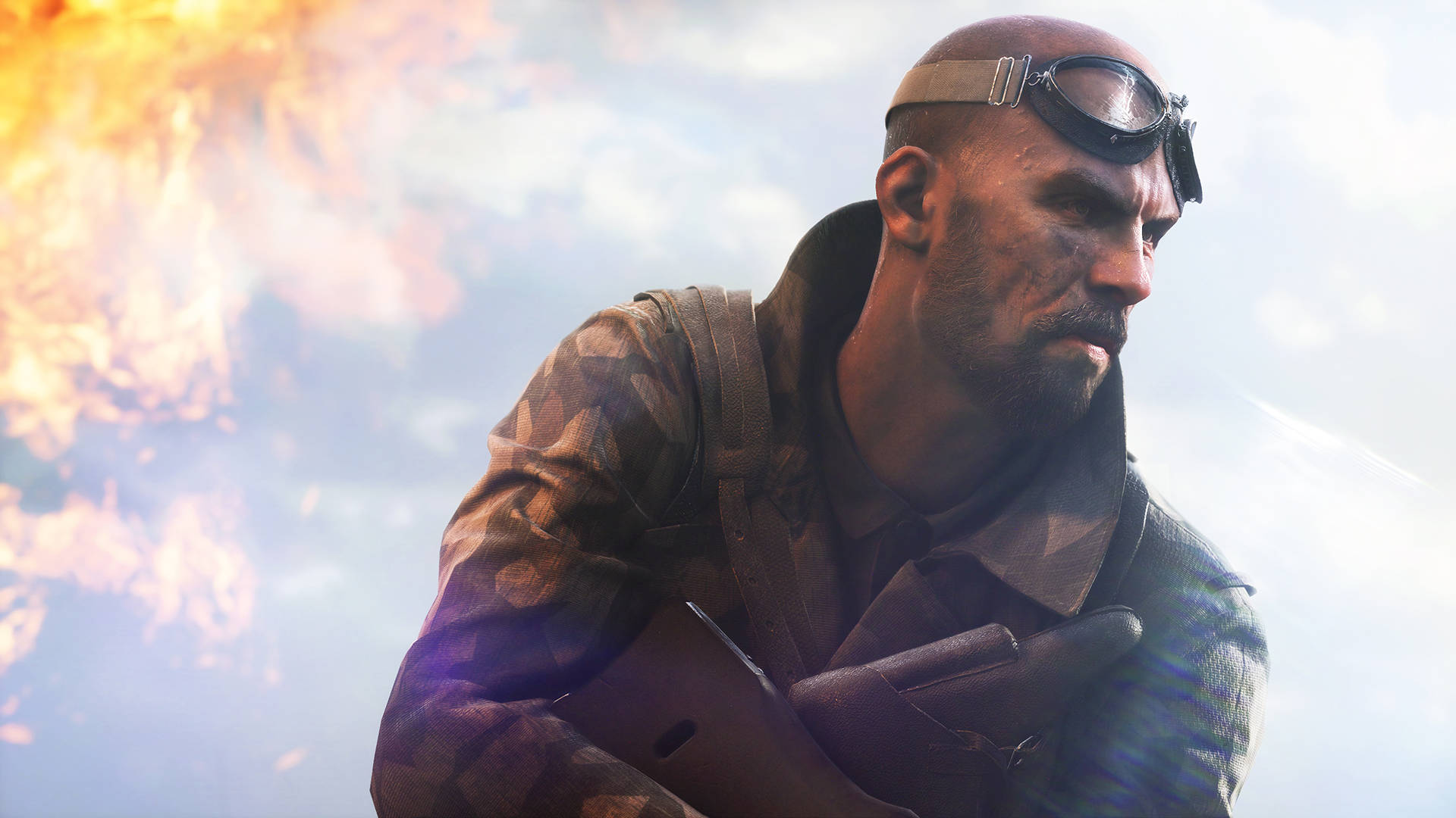Battlefield 5 桌布 壁紙 — 一名光頭士兵戴著護目鏡和迷彩裝備，在熾熱爆炸和煙霧的背景下堅定地站立。