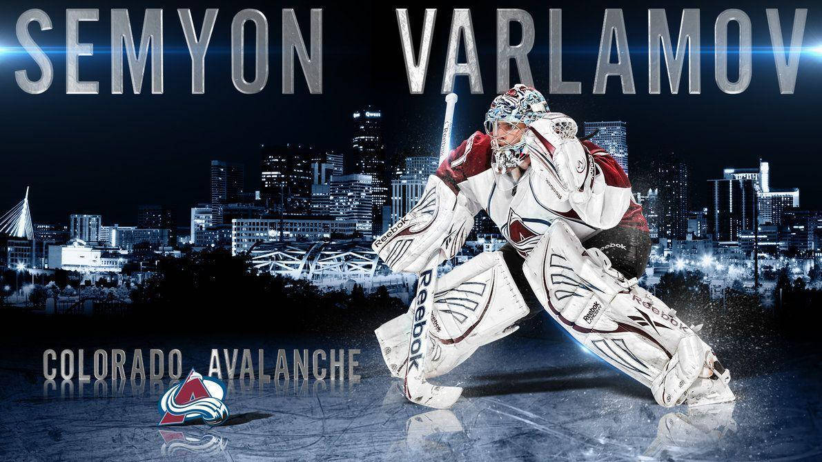 Avalanche 桌布 壁紙 — 一名全副武裝的冰球守門員蹲在冰上，背後的城市天際線在夜燈下閃耀。
