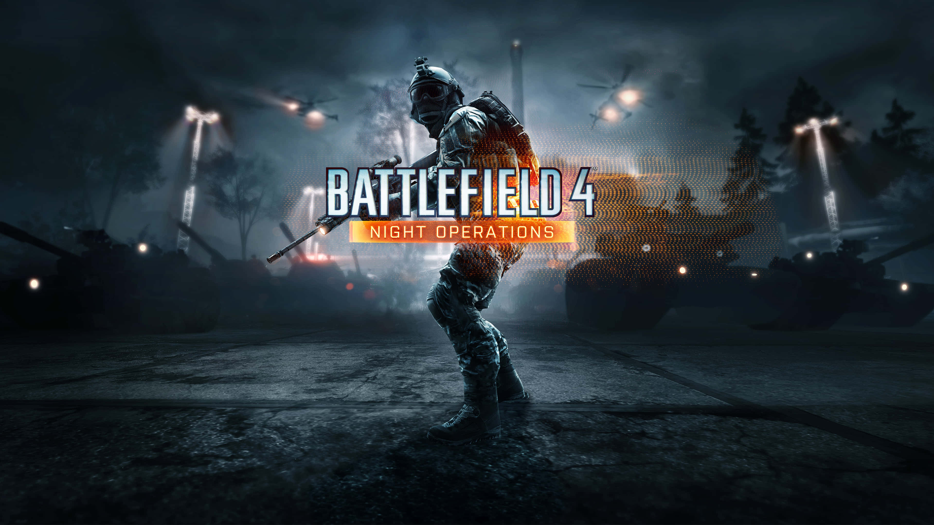 Battlefield Desktop 桌布 壁紙 — 一名全副武裝的士兵在夜間，於坦克和直升機之間，在戲劇性的燈光下準備就緒。