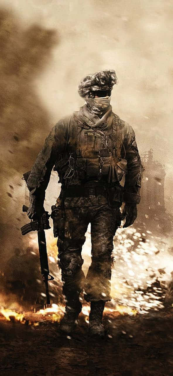 使命召喚 桌布 壁紙 — 一名全副武裝的士兵在戰區中穿過煙霧和火焰，身後有爆炸。