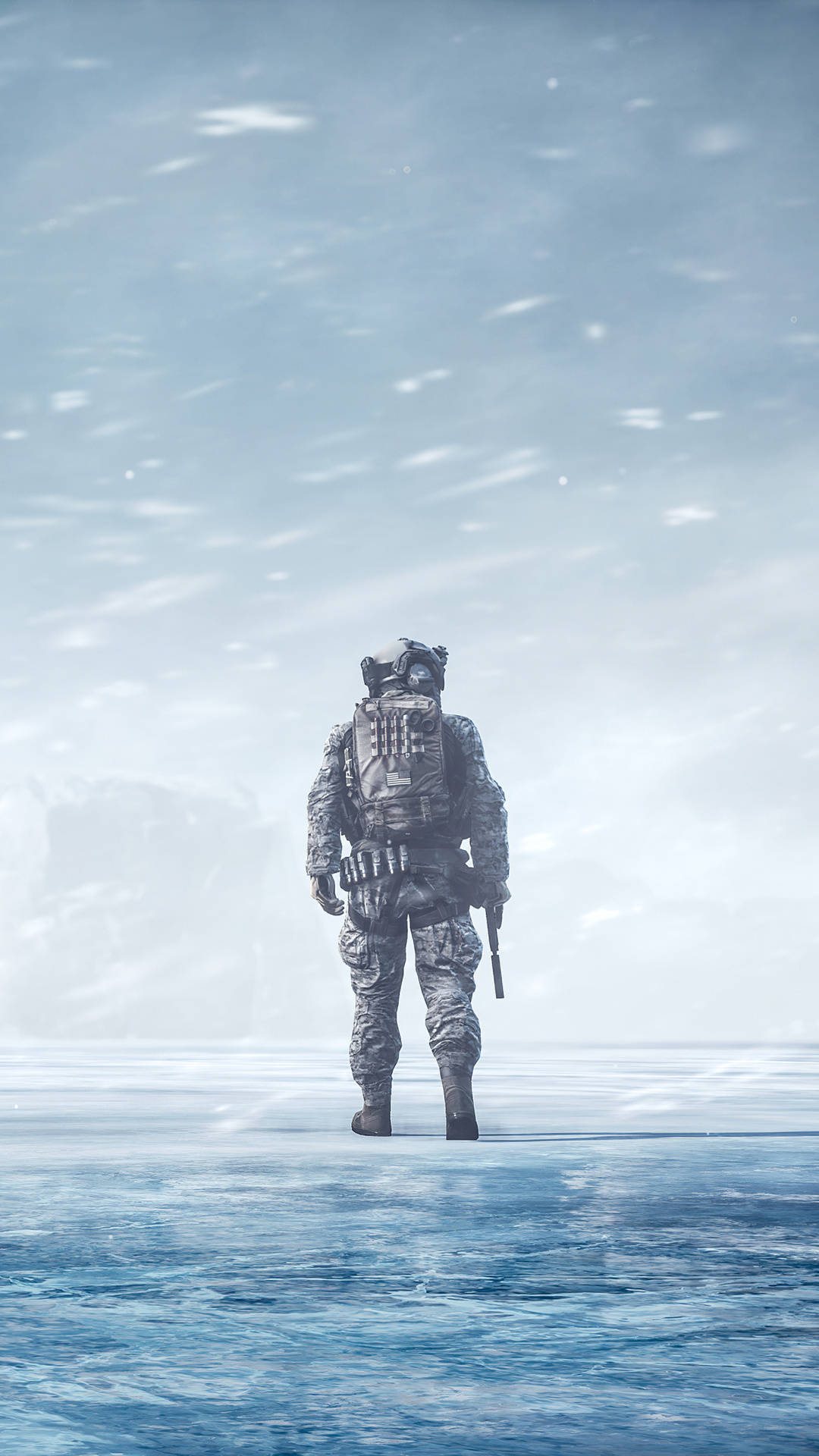 雪 桌布 壁紙 — 一名全副武裝的孤獨士兵站在雪天下冰封的廣闊土地上，面對著冰冷的水平線。