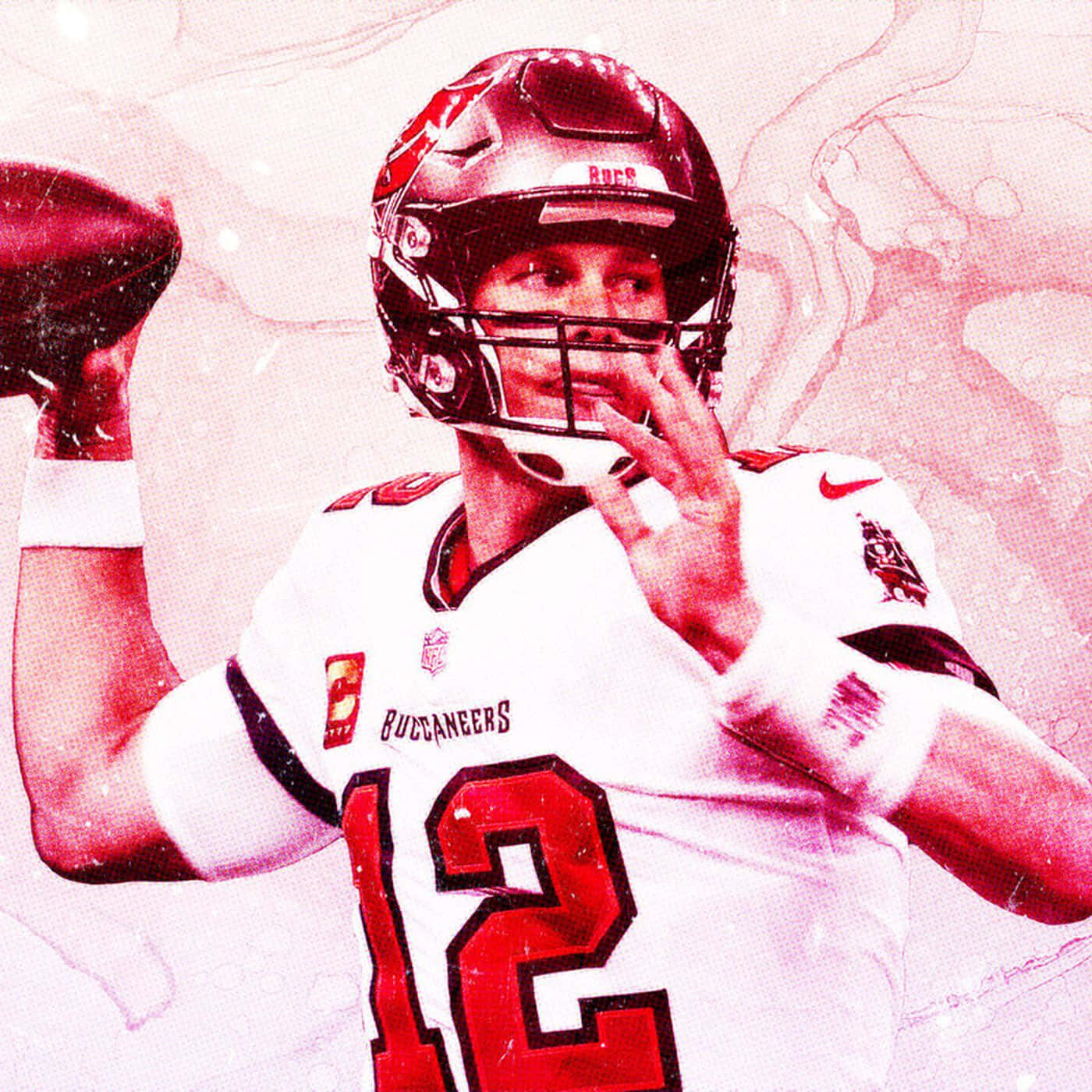Tom Brady Goat 桌布 壁紙 — 一名坦帕灣海盜隊的四分衛身穿白色球衣，紅色12號碼，準備在帶有紋理的粉紅和白色背景前投擲橄欖球。