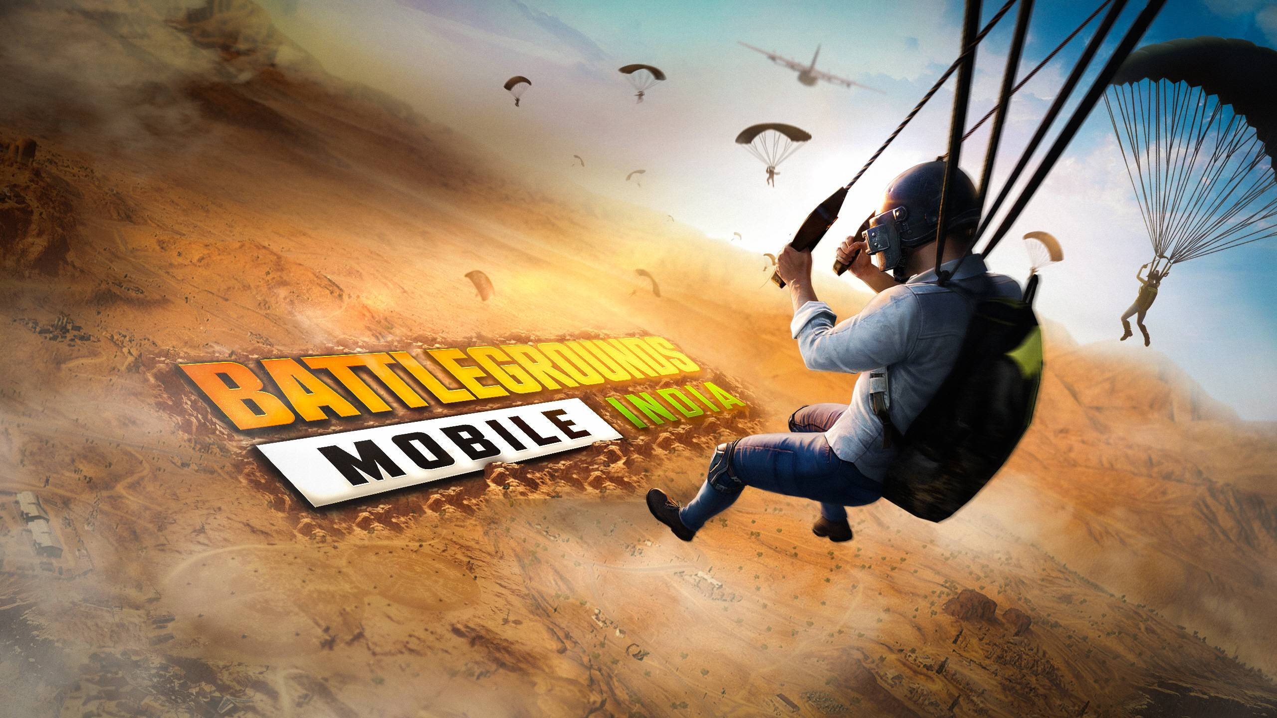 電玩遊戲 桌布 壁紙 — 一名士兵在沙漠戰場上空跳傘，其他玩家在Battlegrounds Mobile India遊戲標誌中下降。