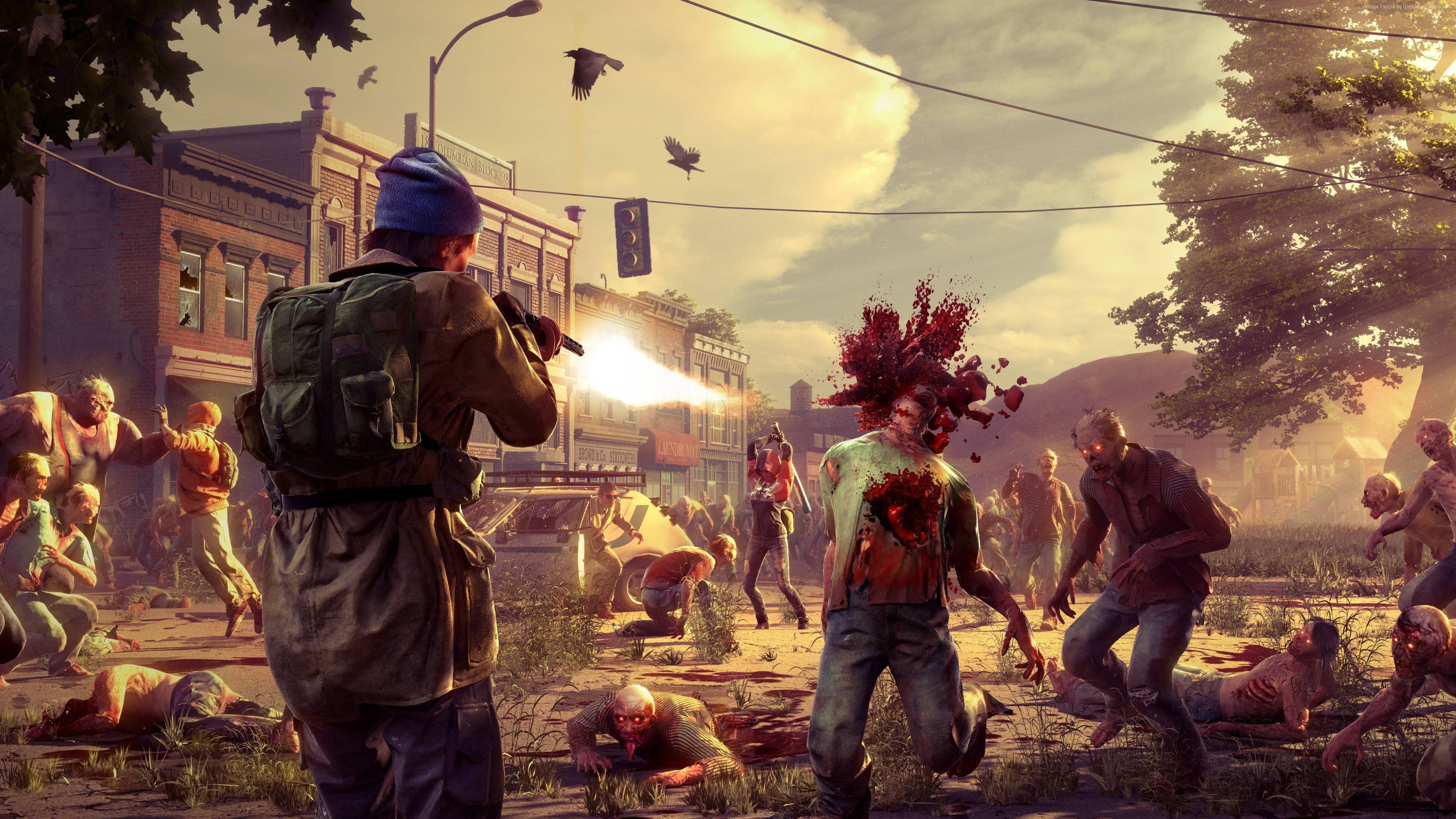 Zombie Apocalypse 桌布 壁紙 — 一名士兵在陽光照耀的廢墟城鎮街道上向一群殭屍開火。