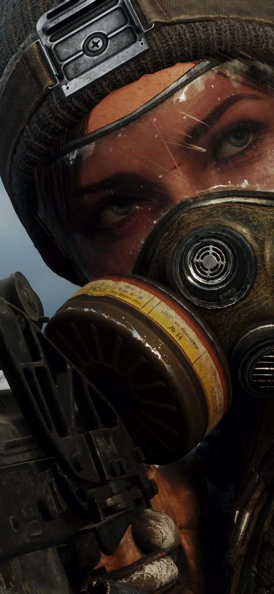 iPhone X Metro Exodus 桌布 壁紙 — 一名士兵戴著破舊的防毒面具，手持步槍，眼神銳利而專注，背景是陰暗的天空。