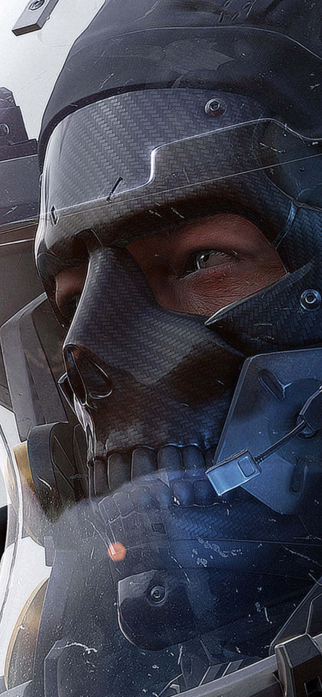 iPhone Xs Death Stranding 桌布 壁紙 — 一名士兵戴著碳纖維頭盔，頭盔上有骷髏設計，一隻眼睛清晰可見，凝視著鏡頭的近距離特寫。