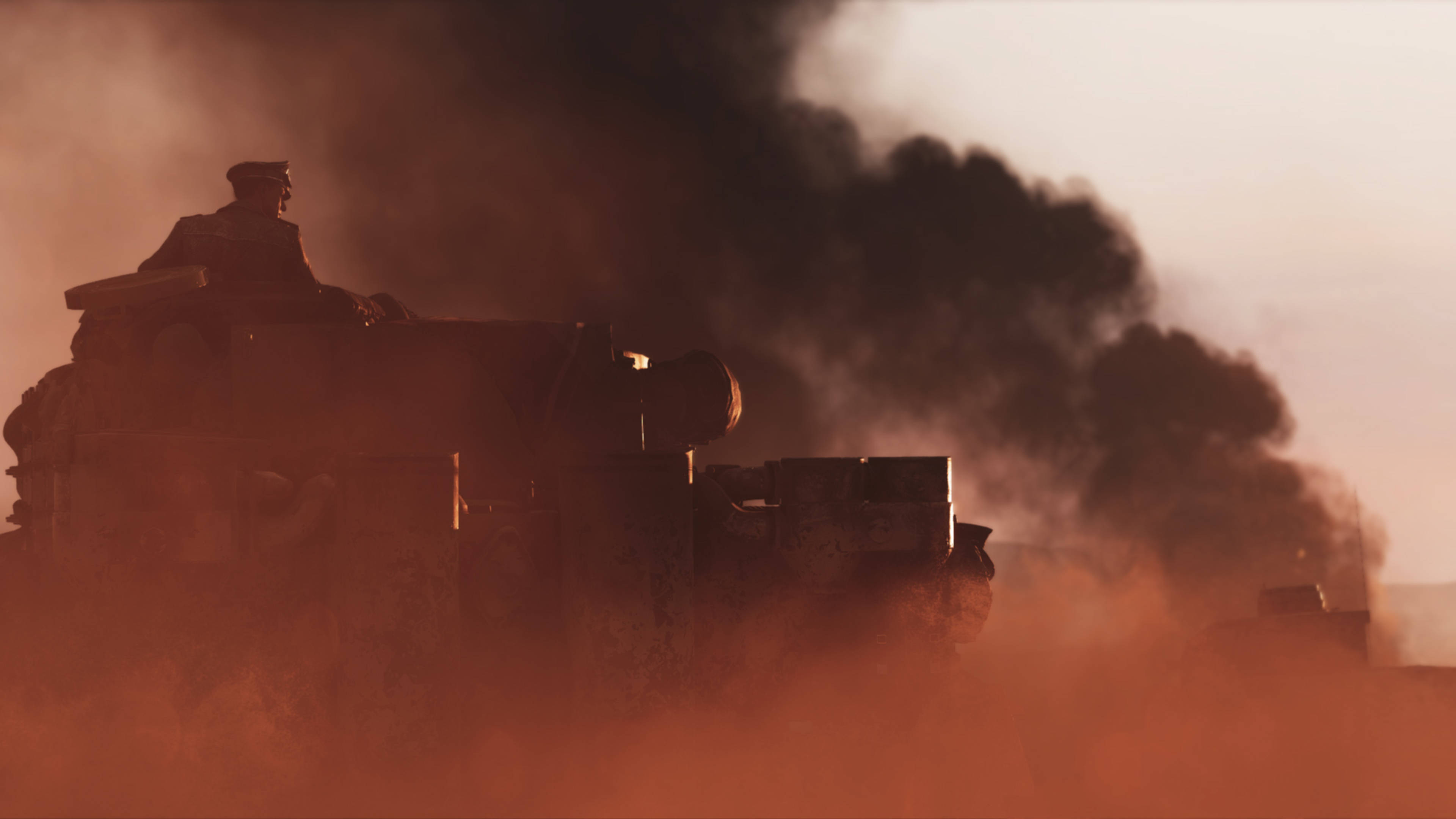 soldier 桌布 壁紙 — 一名士兵站在坦克上，濃濃的黑煙在火紅的橙色日落天空背景下翻滾。