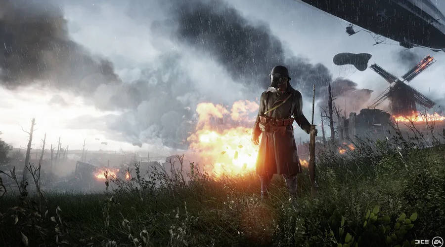 Battlefield 1 HD 桌布 壁紙 — 一名士兵站在被雨水浸透的戰場上，身後在暴風雨的天空下爆炸和煙霧升騰。
