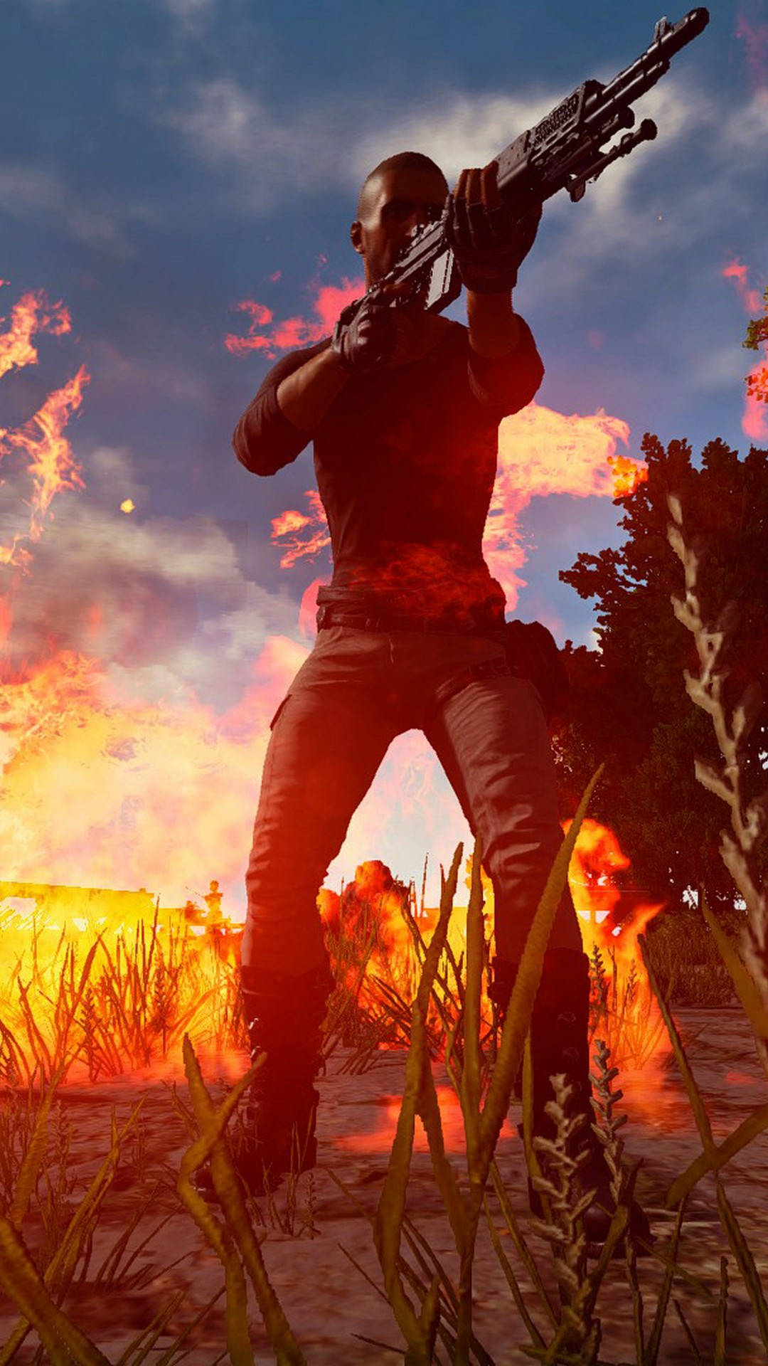 士兵在田野中手持步槍，身處日落時分的熾熱爆炸中。 — PUBG 4K 壁紙 壁紙