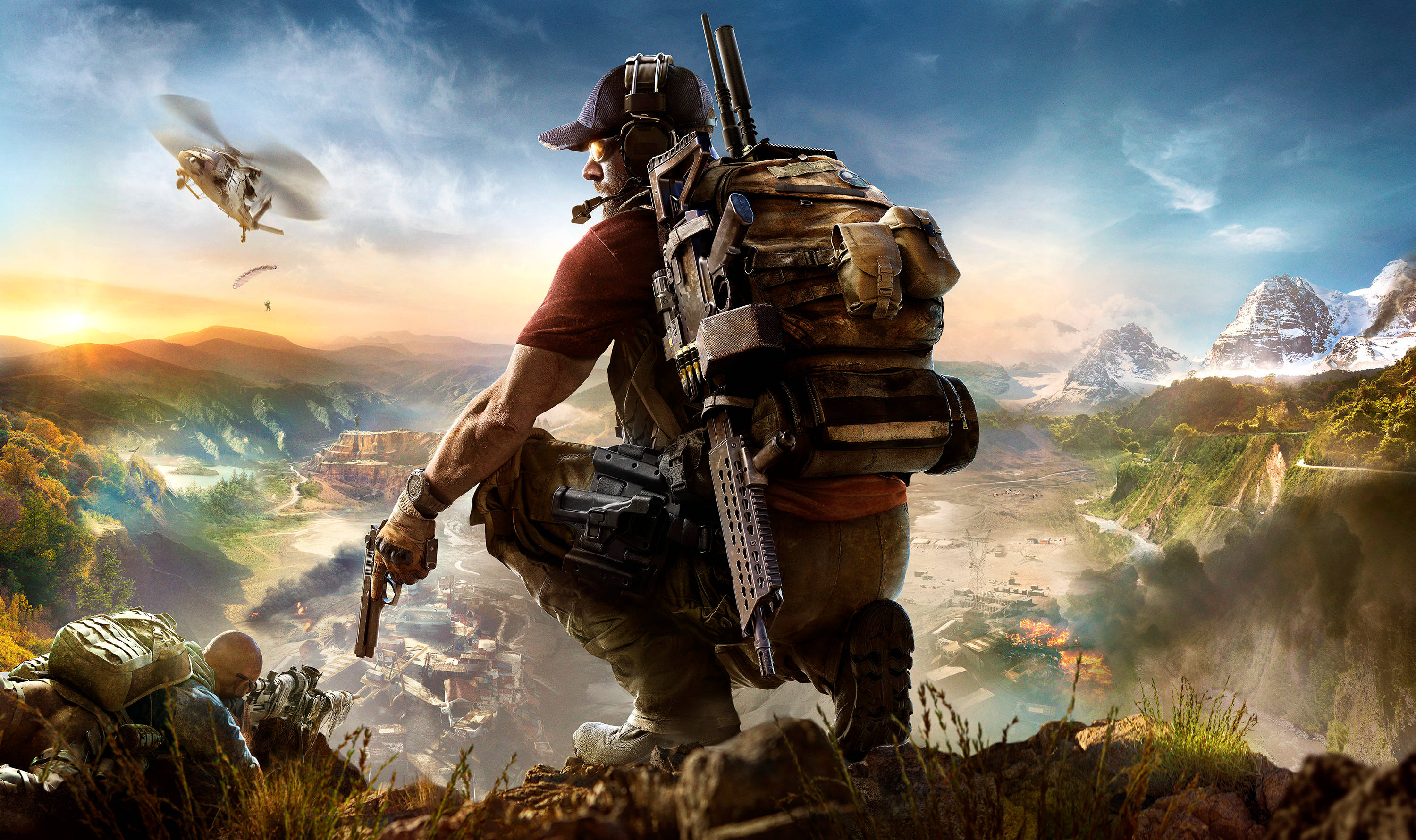 tom clancy's ghost recon wildlands 桌布 壁紙 — 一名士兵蹲在懸崖上，俯瞰夕陽下的山谷，頭頂有直升機飛過，遠處是白雪覆蓋的山脈。