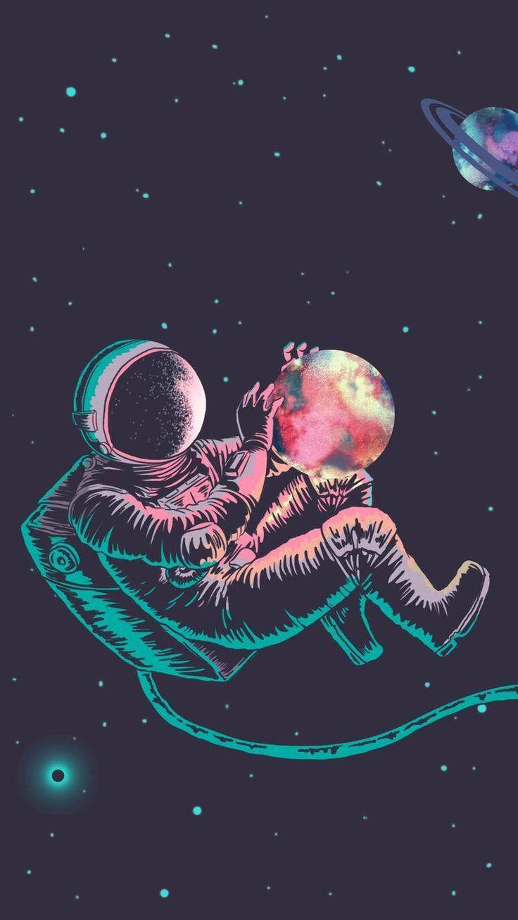 太空人在浩瀚太空中懷抱一顆色彩繽紛的行星。 — 行星動畫 壁紙