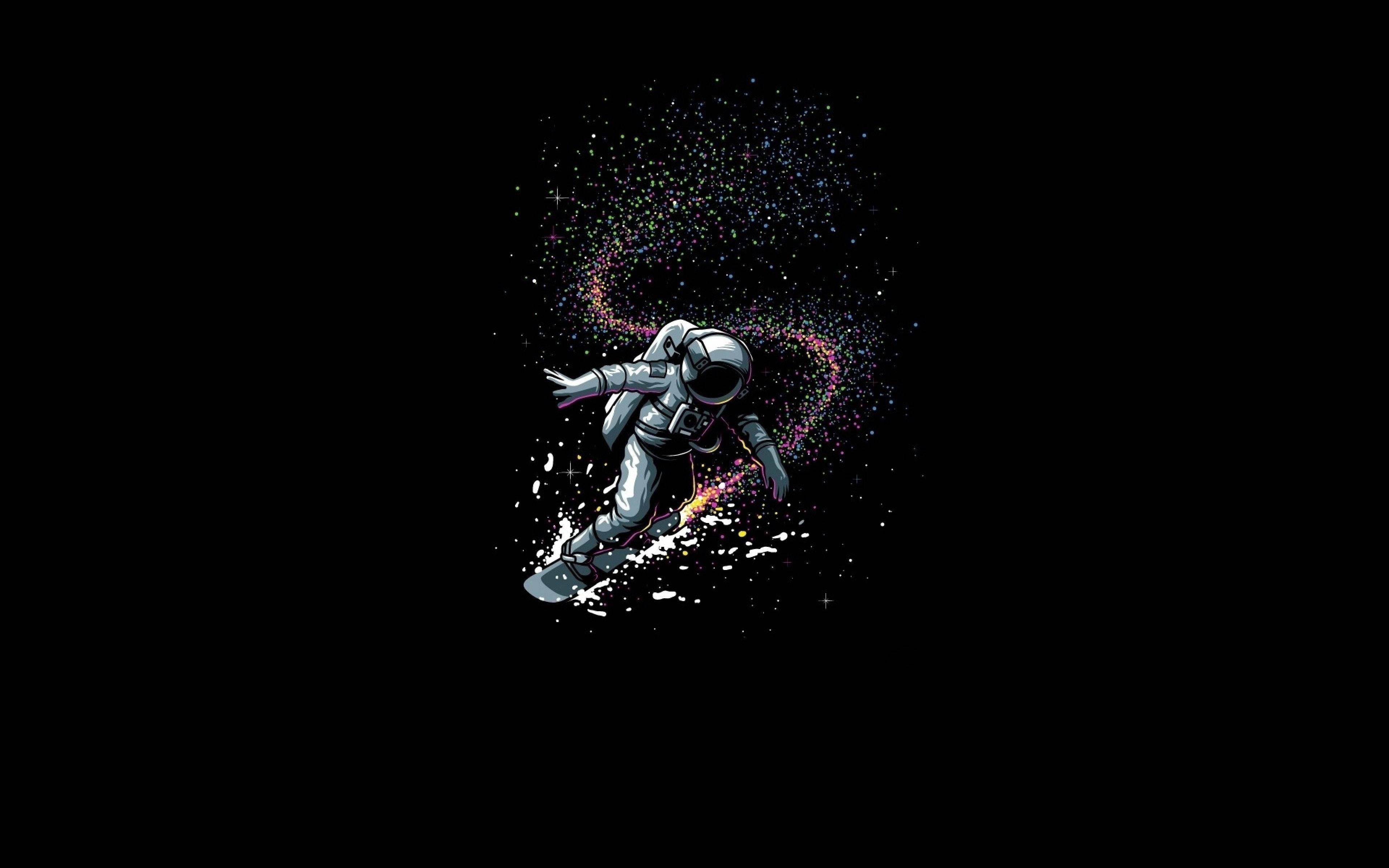 美學 桌布 壁紙 — 一名太空人在宇宙星雲中滑雪，在黑色虛空中留下一串彩色火花。