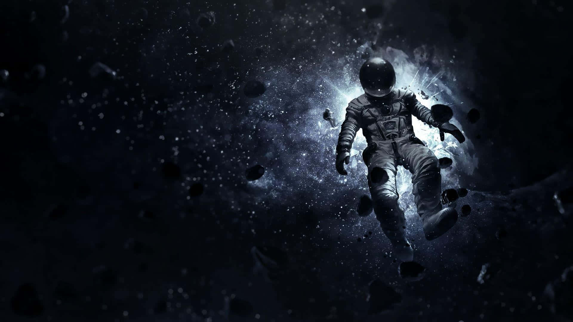 Astronaut Desktop 桌布 壁紙 — 一名太空人在深空中漂浮，周圍有漂浮的碎片和背後發光的宇宙星雲。