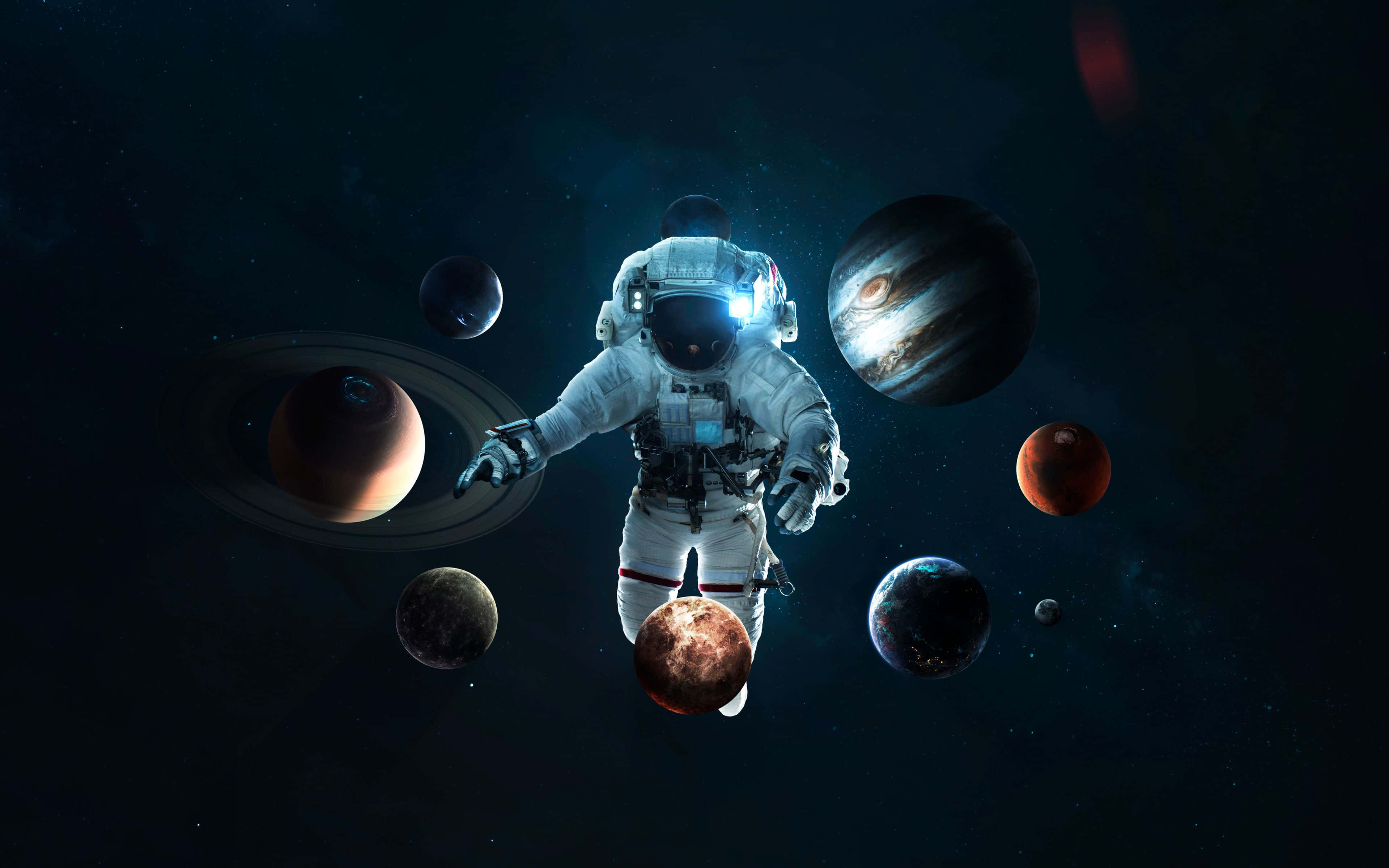 Space Exploration 桌布 壁紙 — 一名太空人在深邃的宇宙虛空中漂浮於色彩繽紛的行星與環之間。