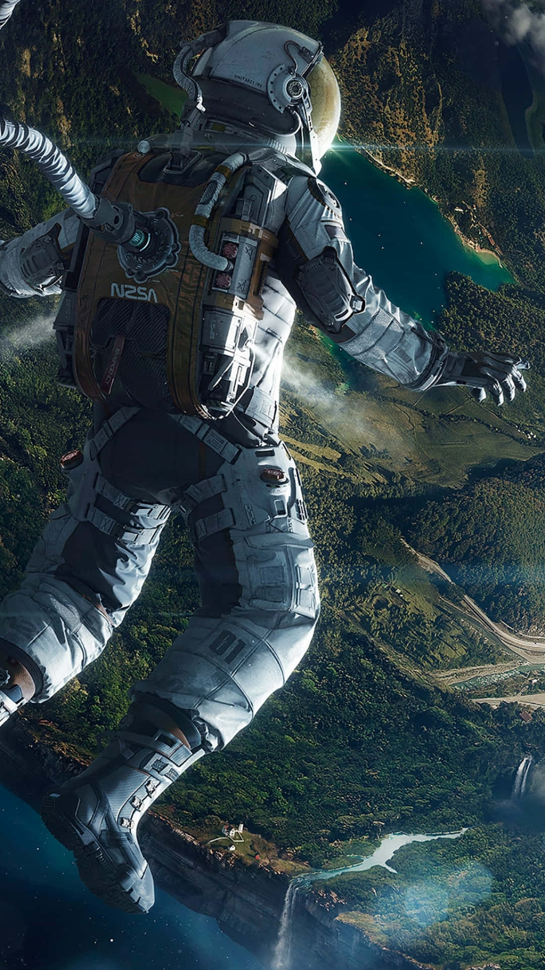 太空人 桌布 壁紙 — 一名太空人漂浮在一個鬱鬱蔥蔥的綠色星球上方，下方有瀑布和蜿蜒的河流。