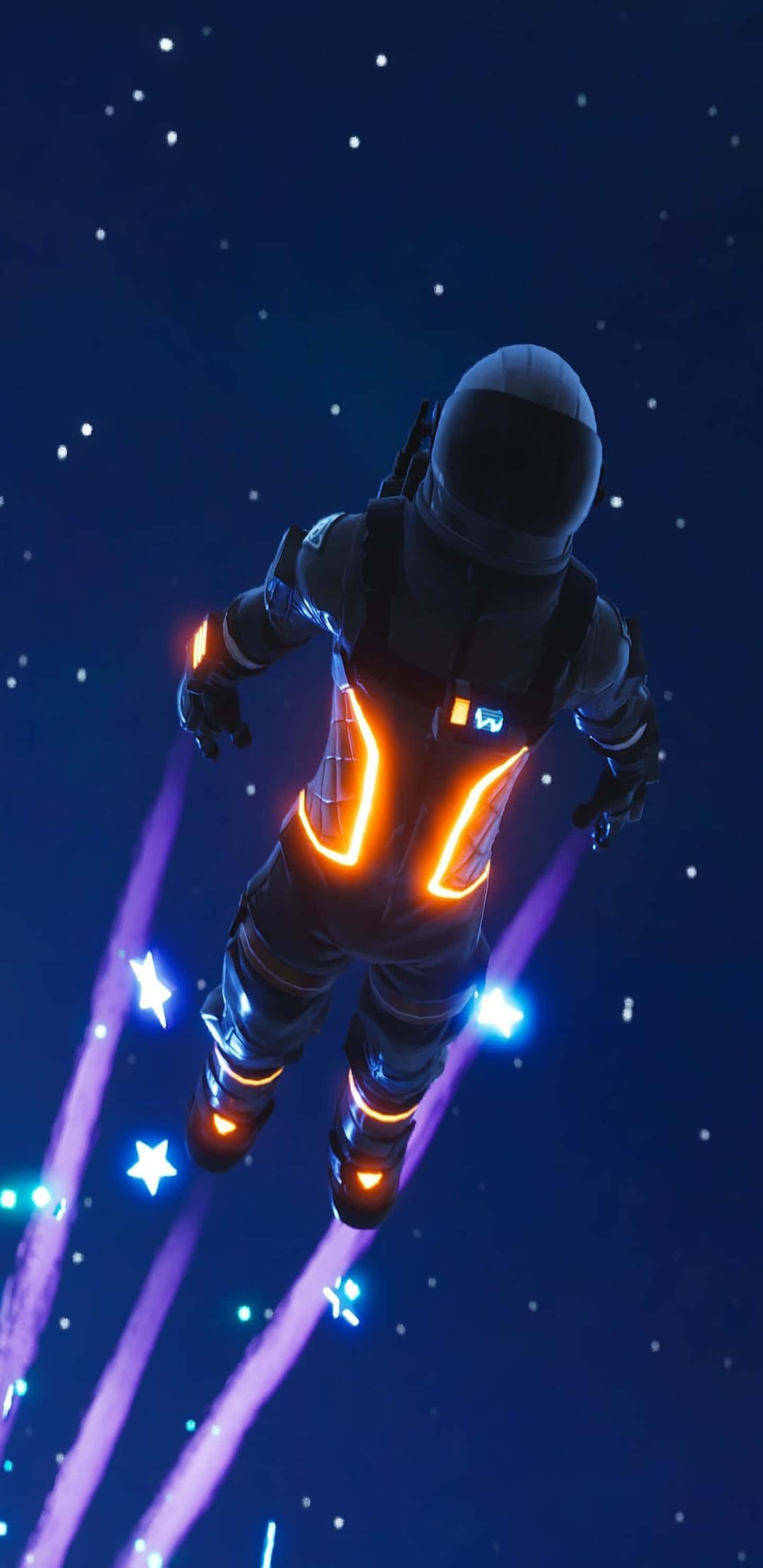Fortnite 桌布 壁紙 — 一名太空人漂浮在繁星點點的夜空中，身後留下發光的橙色和藍色軌跡。