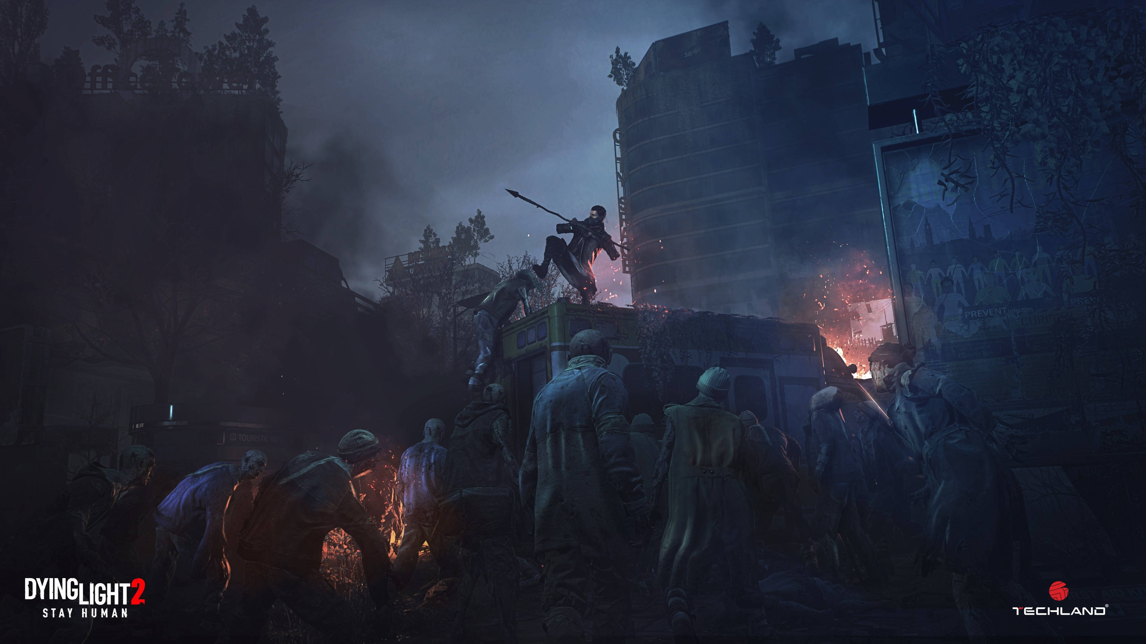 Dying Light 2 桌布 壁紙 — 一名孤獨的倖存者從垃圾箱跳下，而喪屍在下方黑暗煙霧瀰漫的城市小巷中蜂擁而至。