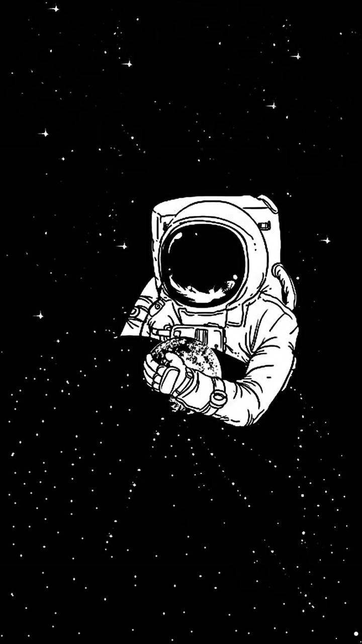 Stars 桌布 壁紙 — 一名孤獨的太空人在繁星點點的太空漂浮，戴著手套的雙手捧著一顆小行星。