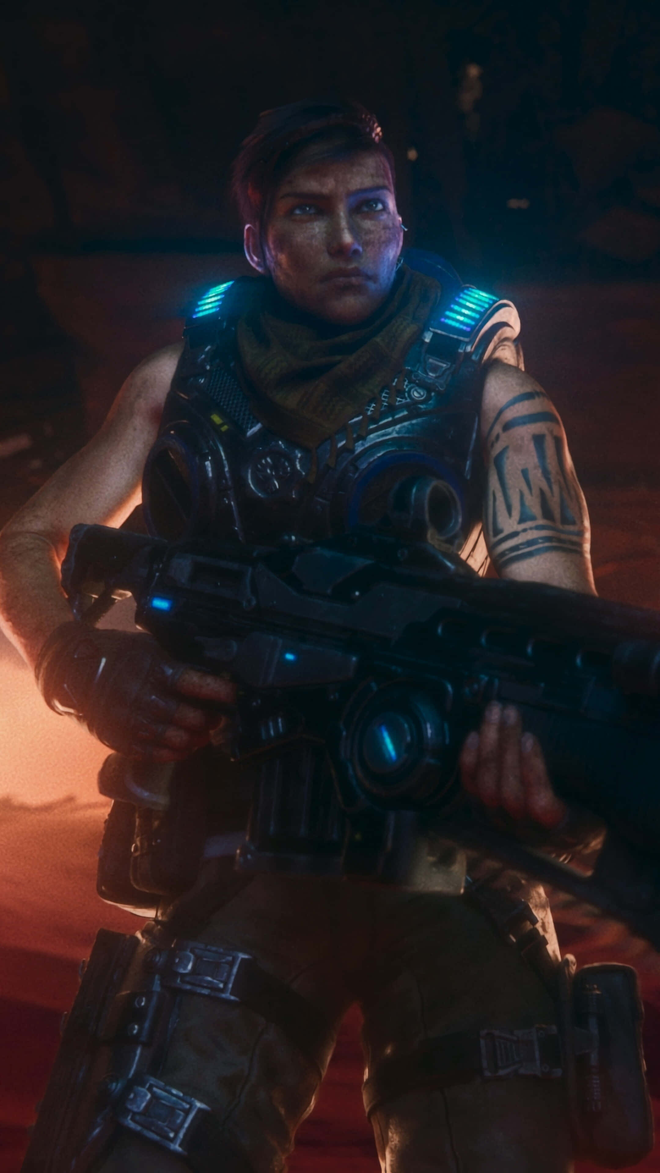 Android Gears Of War 5 桌布 壁紙 — 一名強壯的士兵，身穿發光的藍色盔甲，手持未來武器，在日落時分站在昏暗的外星峽谷中。