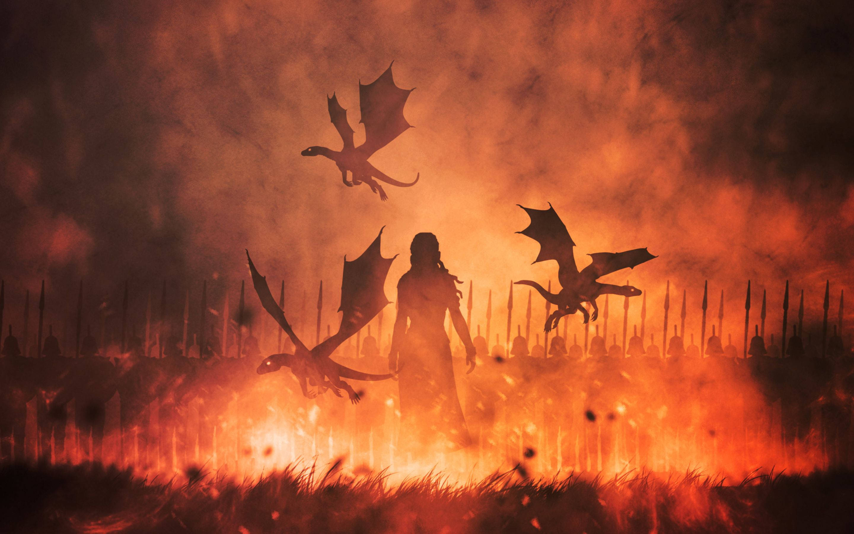 House Targaryen 桌布 壁紙 — 一名戰士在烈火戰場上以剪影姿態站立，龍在煙霧和火焰中翱翔。