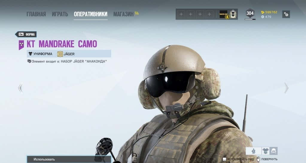 Rainbow Six Siege Jager 桌布 壁紙 — 一名戴著淺褐色頭盔和黑色護目鏡的士兵站在顯示 'KT Mandrake Camo' 服裝的遊戲選單中。