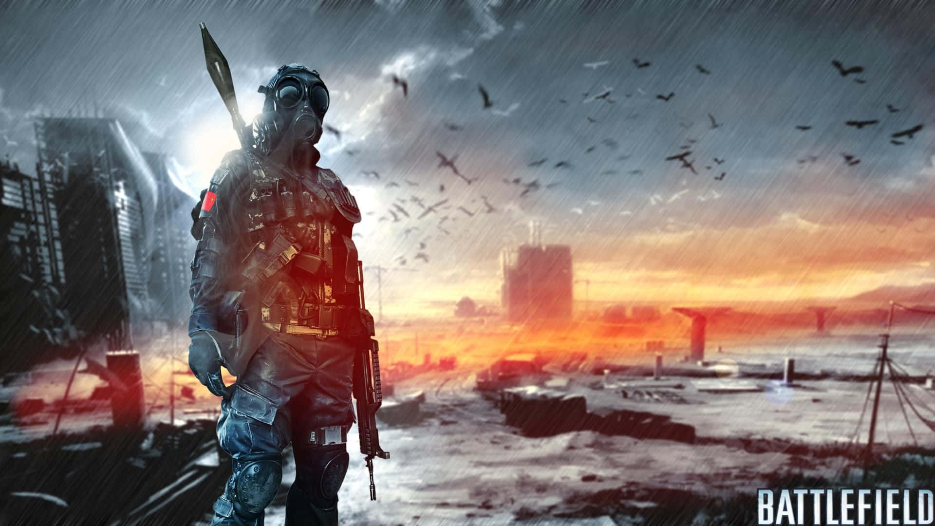 Battlefield Desktop 桌布 壁紙 — 一名戴著防毒面具和戰鬥裝備的士兵站在被雨水浸透的廢墟城市中，夕陽西下，鳥兒在頭頂飛翔。