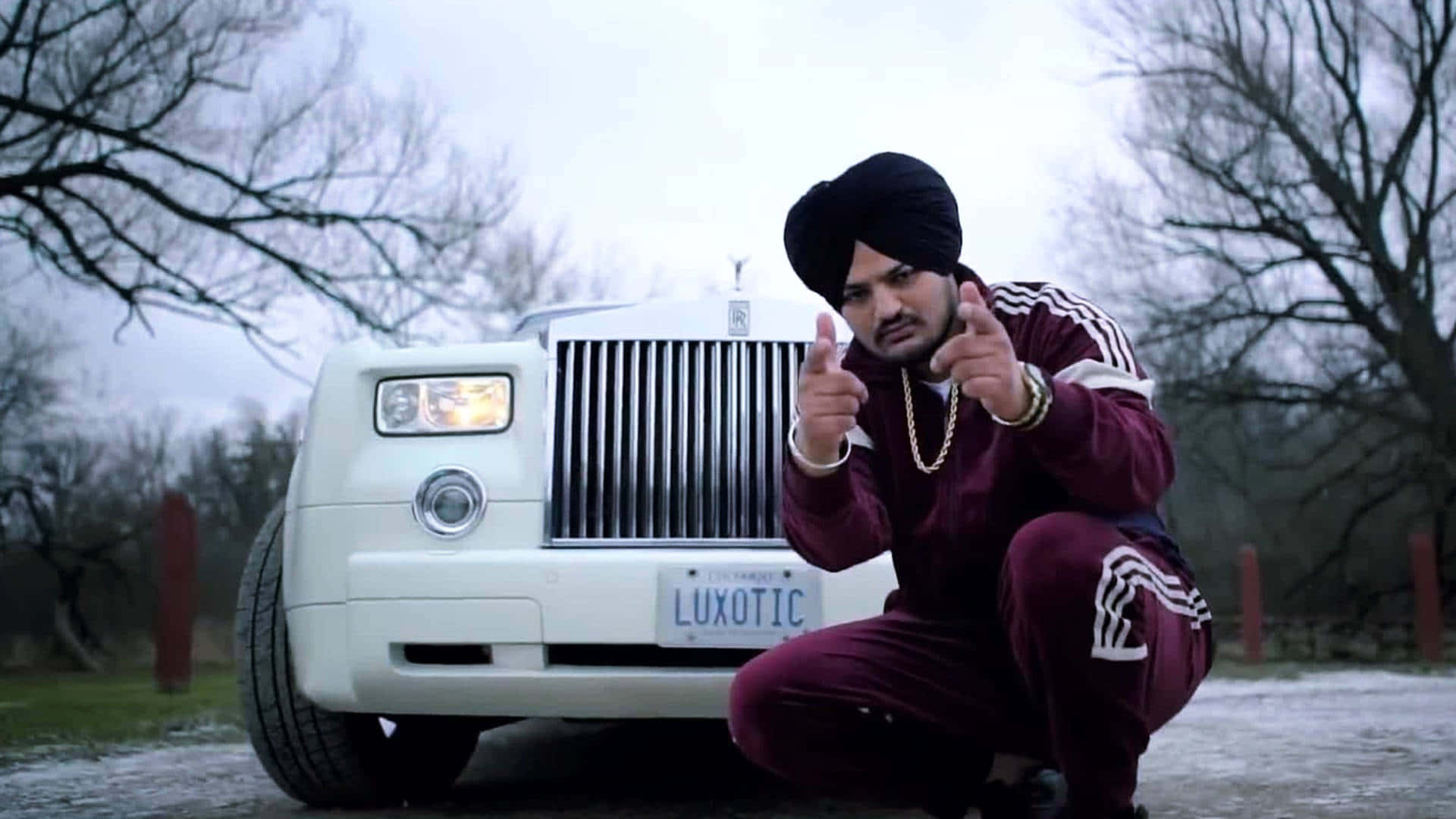 戴頭巾男子拍照 — Sidhu Moose Wala 壁紙