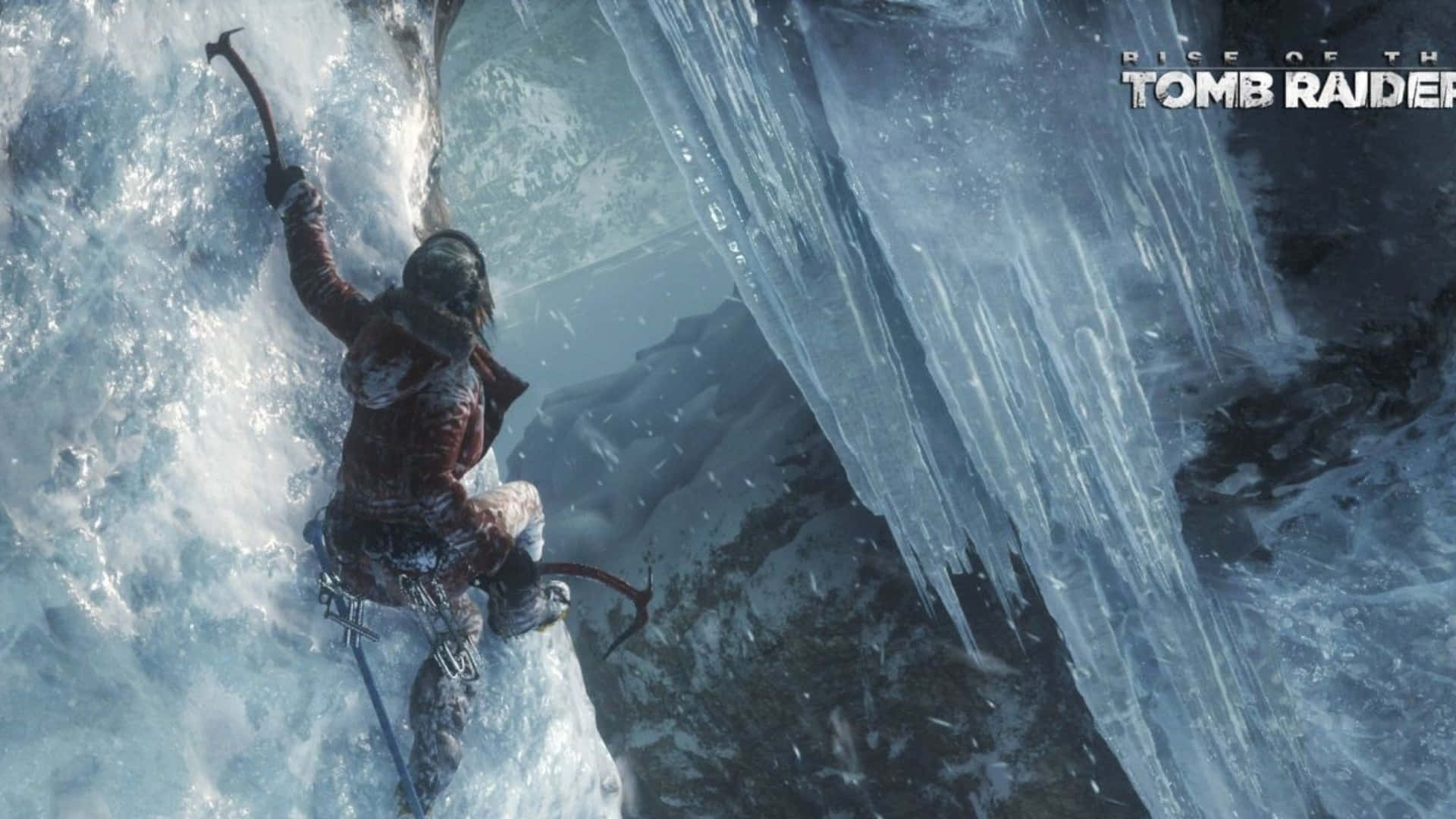Lara Croft 桌布 壁紙 — 一名攀岩者用冰斧攀登陡峭的冰崖，身處雪山的環境中。
