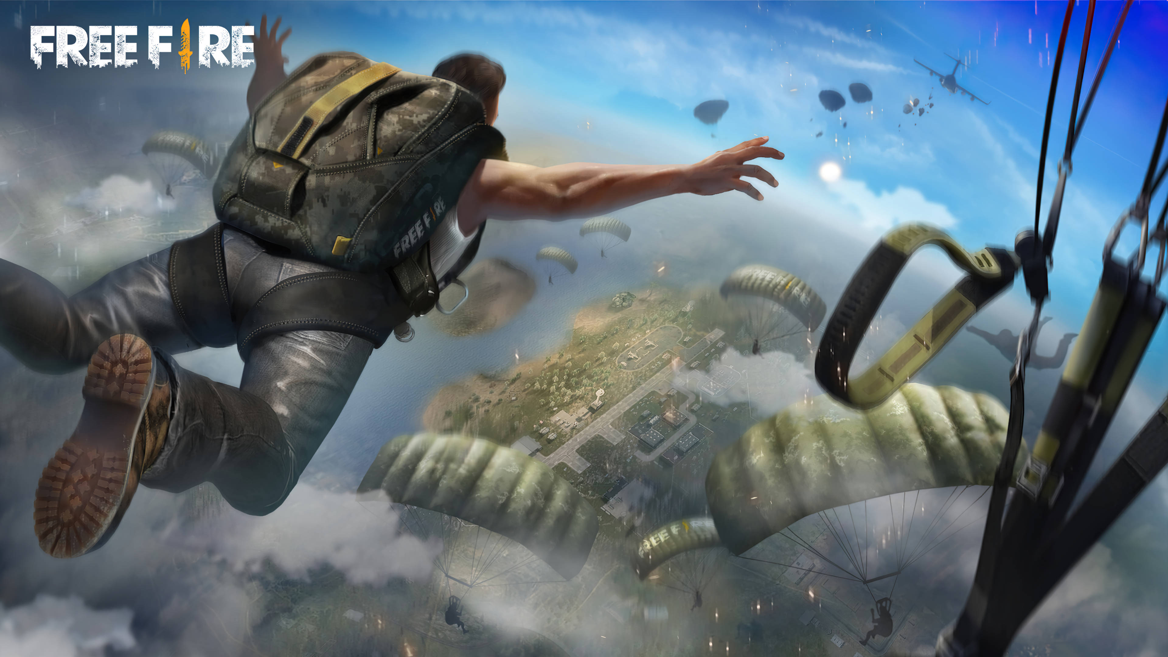 free fire bundle 桌布 壁紙 — 一名玩家背著背包在廣闊的島嶼戰場上空跳傘，其他降落傘在下方下降。