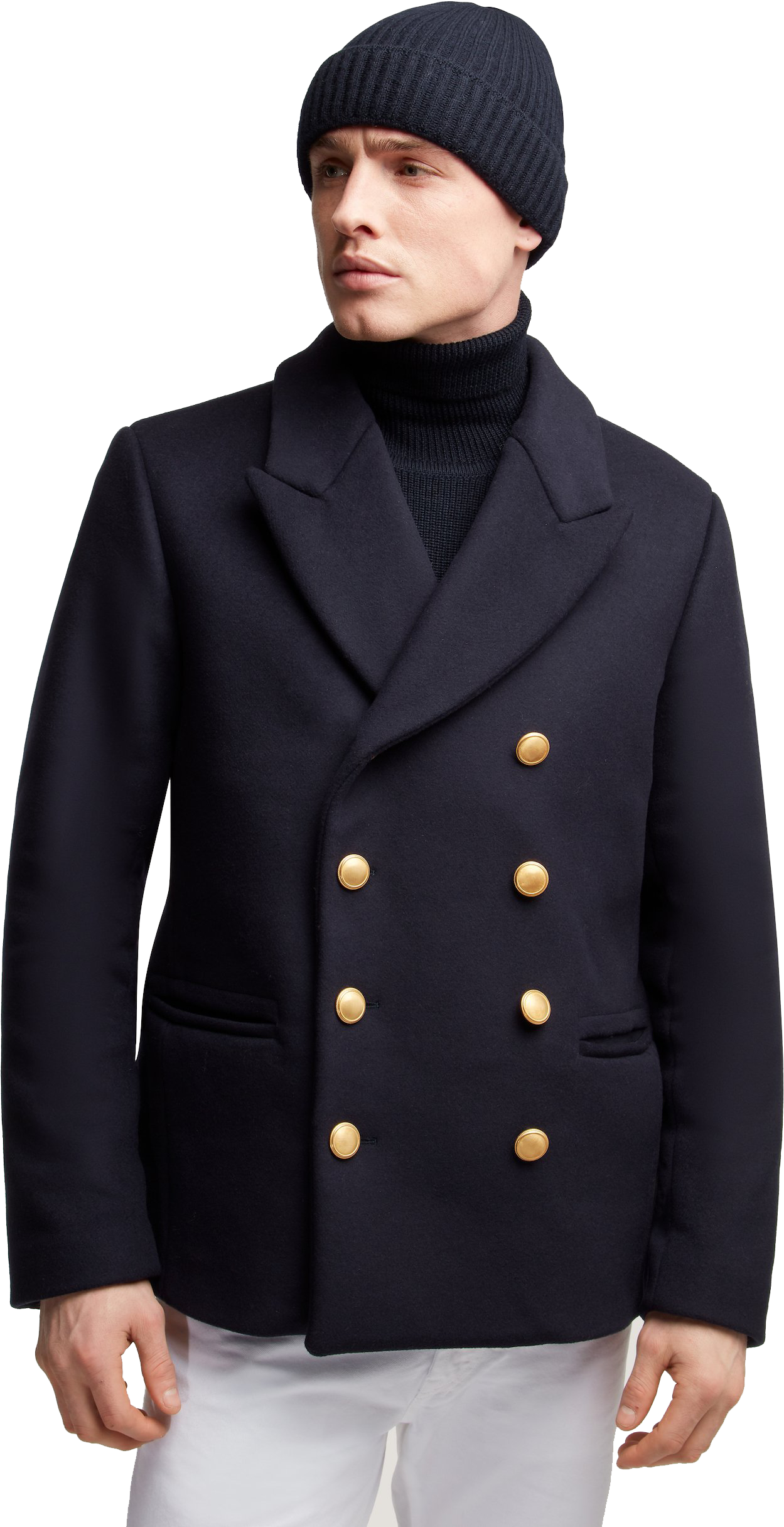 Mens Fashion 桌布 壁紙 — 一名男子身穿海軍藍雙排扣豌豆大衣，配金色鈕扣和針織冷帽，站在黑色背景前。