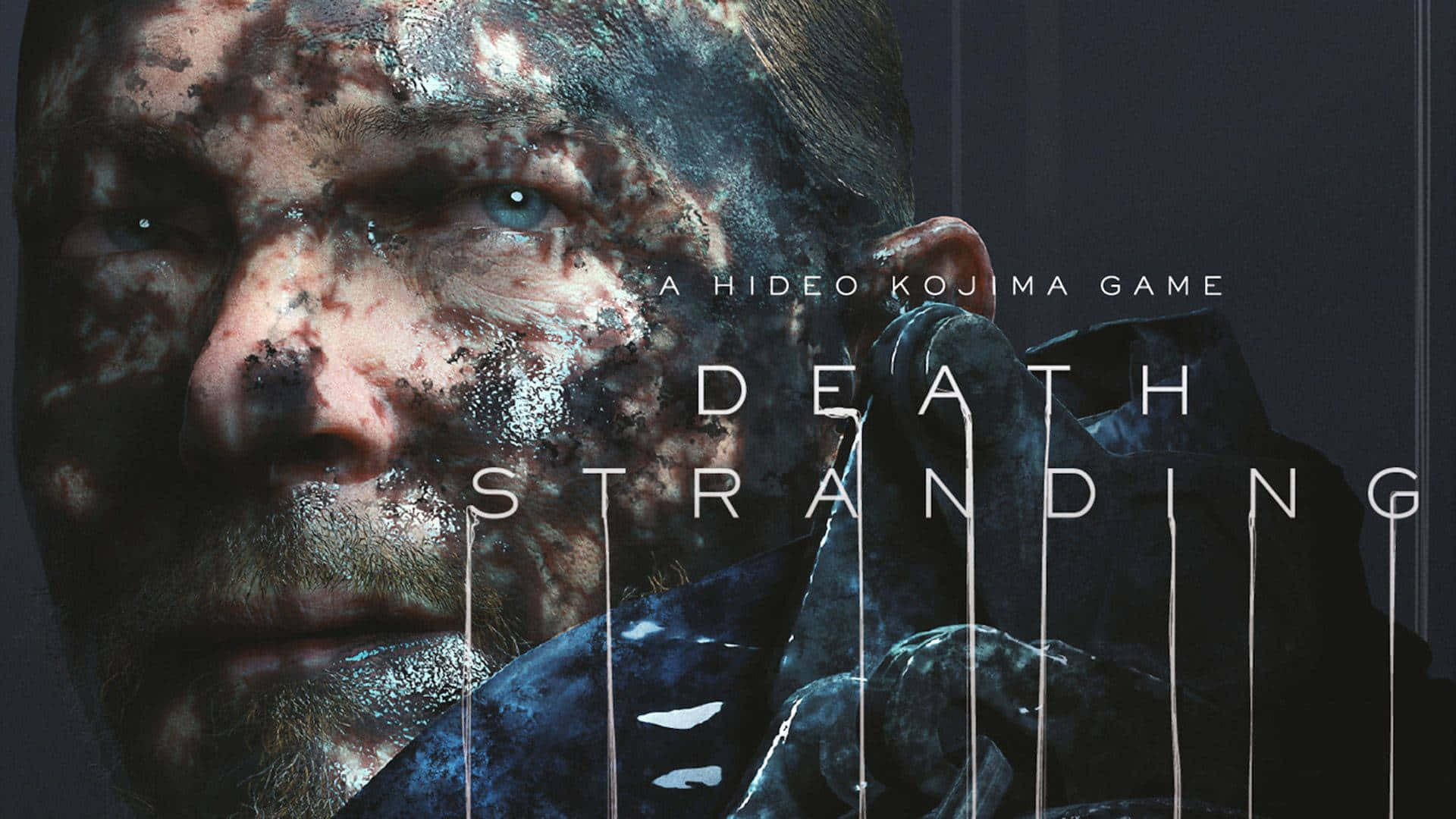 HD Death Stranding 桌布 壁紙 — 一名男子飽經風霜的臉部特寫，佈滿霜雪和污垢，並以醒目的白色文字疊加遊戲標題 Death Stranding。