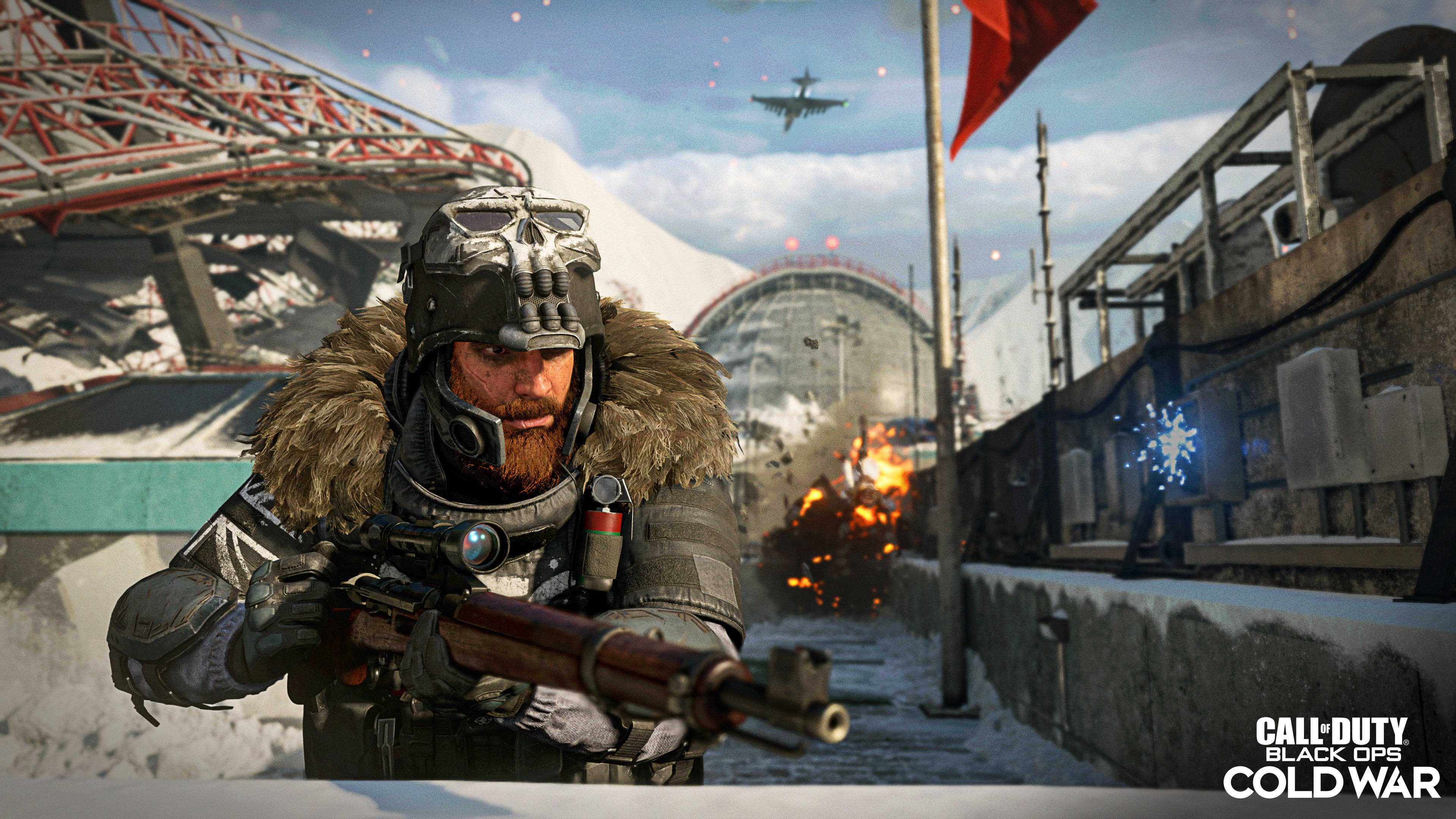 Cod 桌布 壁紙 — 一名留鬍鬚的士兵身穿冬季裝備，在積雪廢墟中瞄準步槍，頭頂有爆炸和戰鬥機。