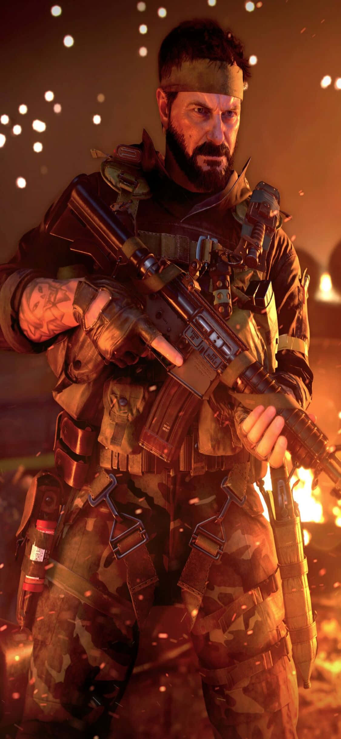 soldier 桌布 壁紙 — 一名留鬍鬚的士兵身穿戰術裝備，在戰區中手持步槍，周圍是熾熱的火花和發光的餘燼。