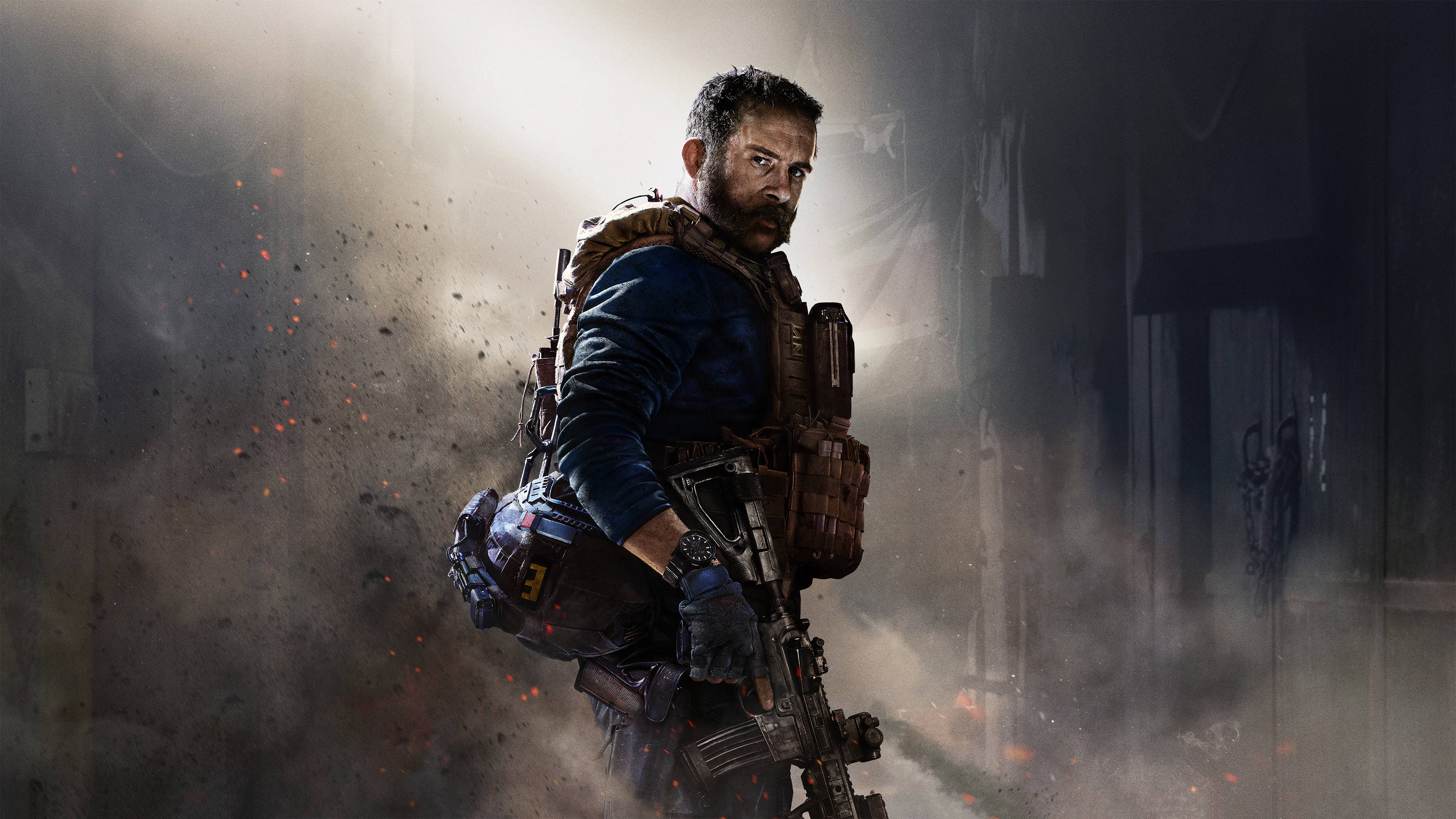 4K call of duty 桌布 壁紙 — 一名留鬍鬚的士兵身穿戰術裝備，站在煙霧瀰漫的廢墟建築中，手持步槍，周圍火花四濺。