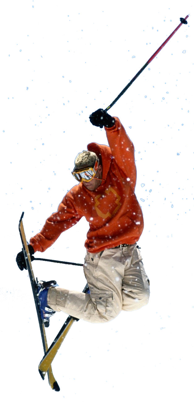 ski 桌布 壁紙 — 一名穿著亮橙色連帽衫的滑雪者，在飄落的雪中騰空而起，滑雪板交叉，雪杖高舉。