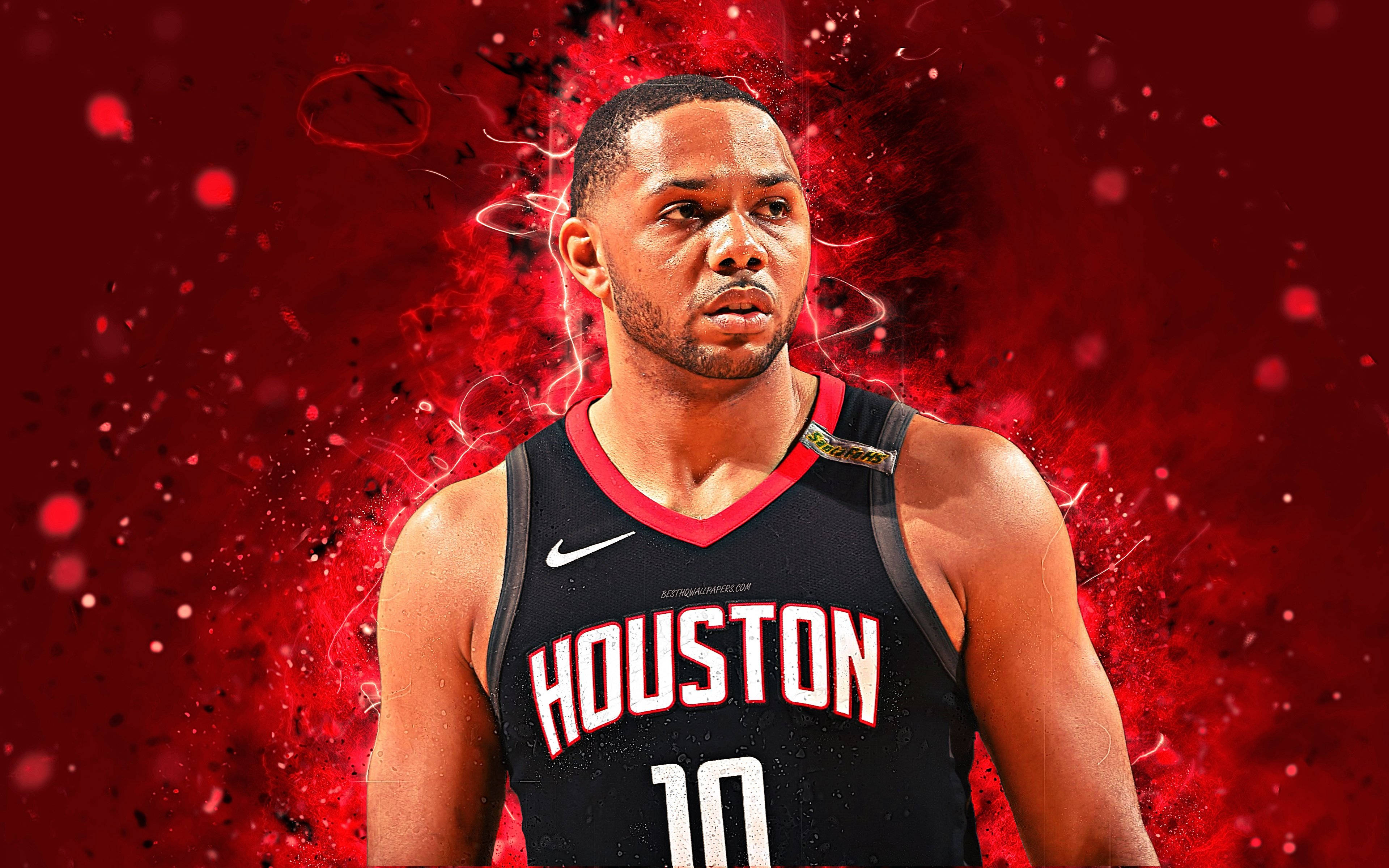 eric gordon 桌布 壁紙 — 一名穿著休士頓球衣的籃球運動員站在動態的紅色背景前，帶有電能效果。